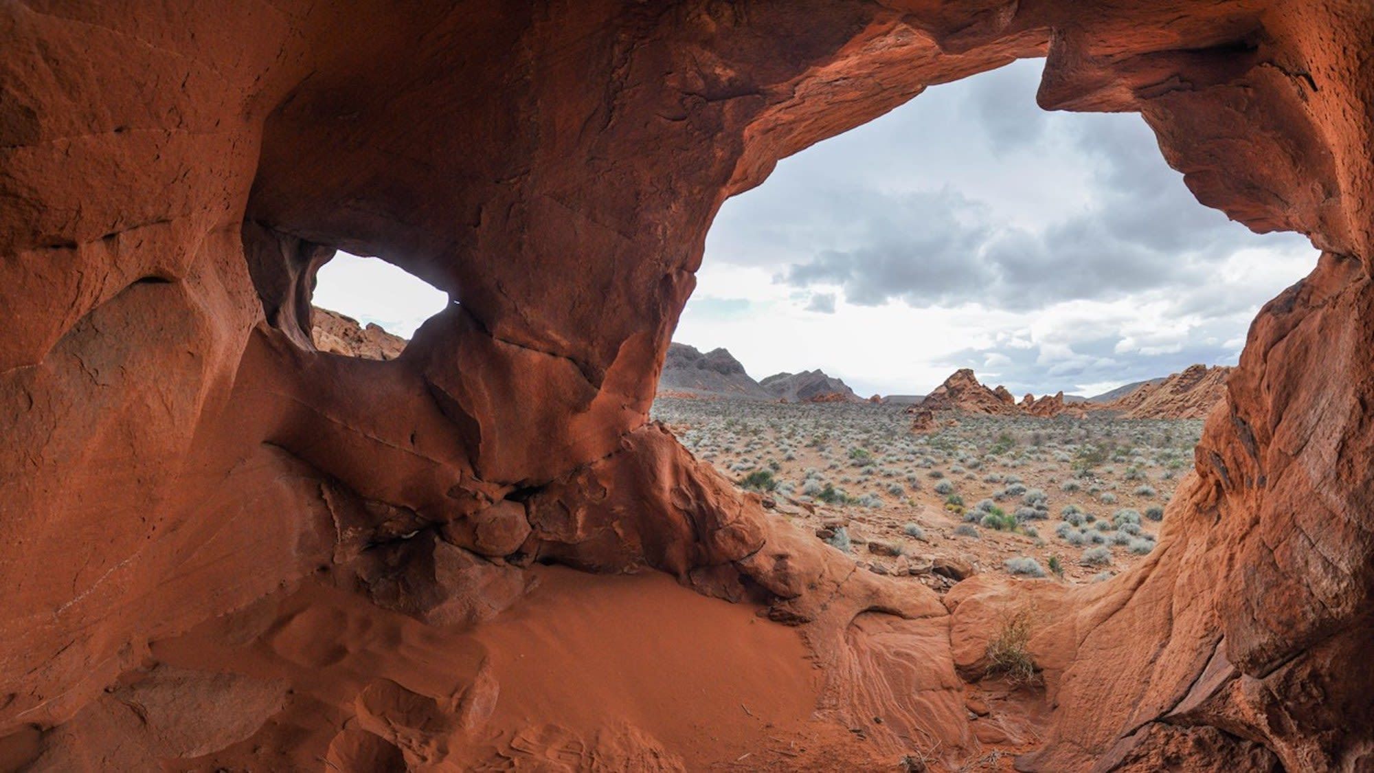 Sculptural rock formations along the Redstone Dune Trail look out over Lake Mead National Recreation Area. Two visitors at the recreation area were captured on video destroying ancient rock formations and park rangers are seeking the public's help in identifying the suspects.