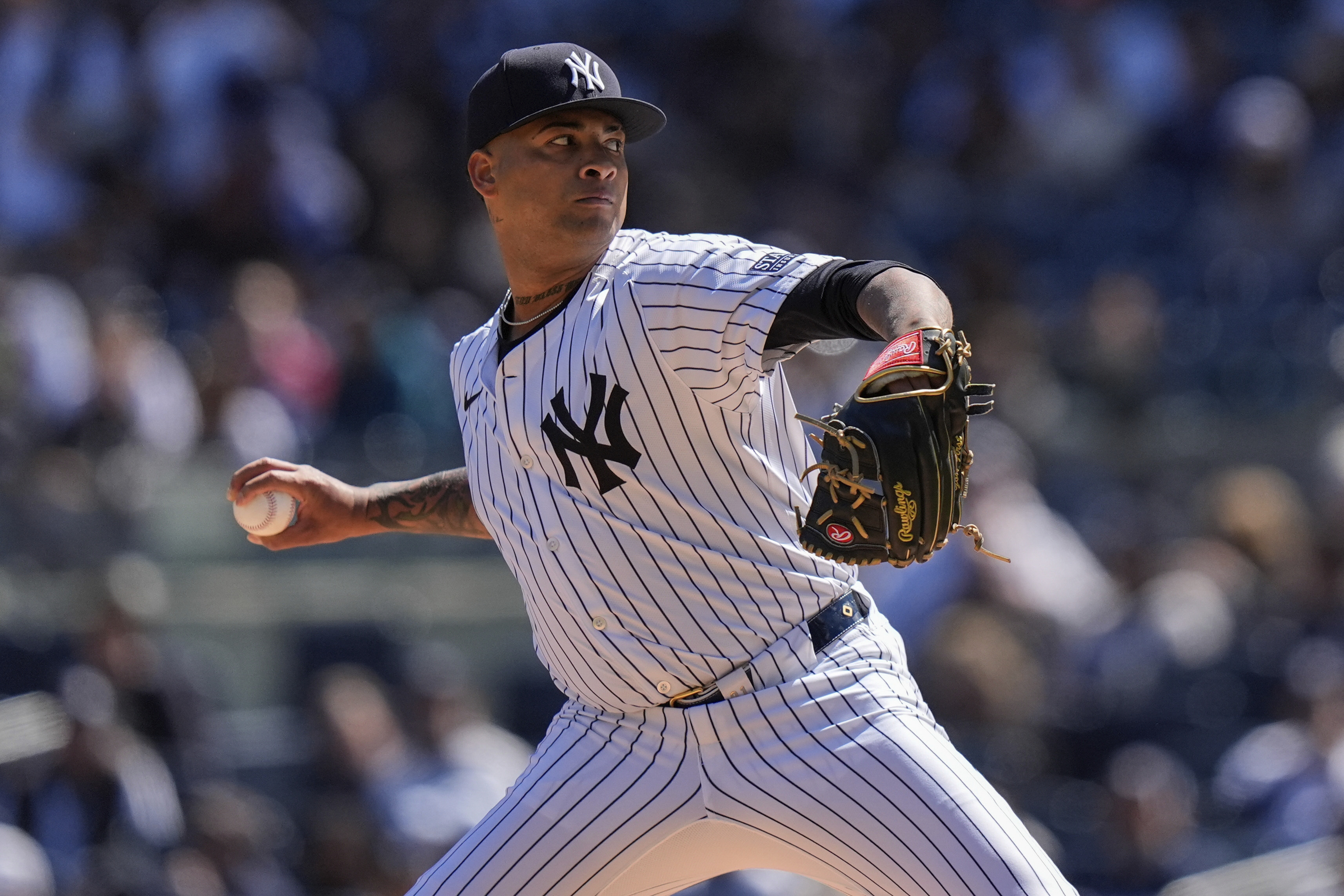 New York Yankees' Luis Gil pitches during the first inning of a baseball game against the Toronto Blue Jays Sunday, April 7, 2024, in New York. 