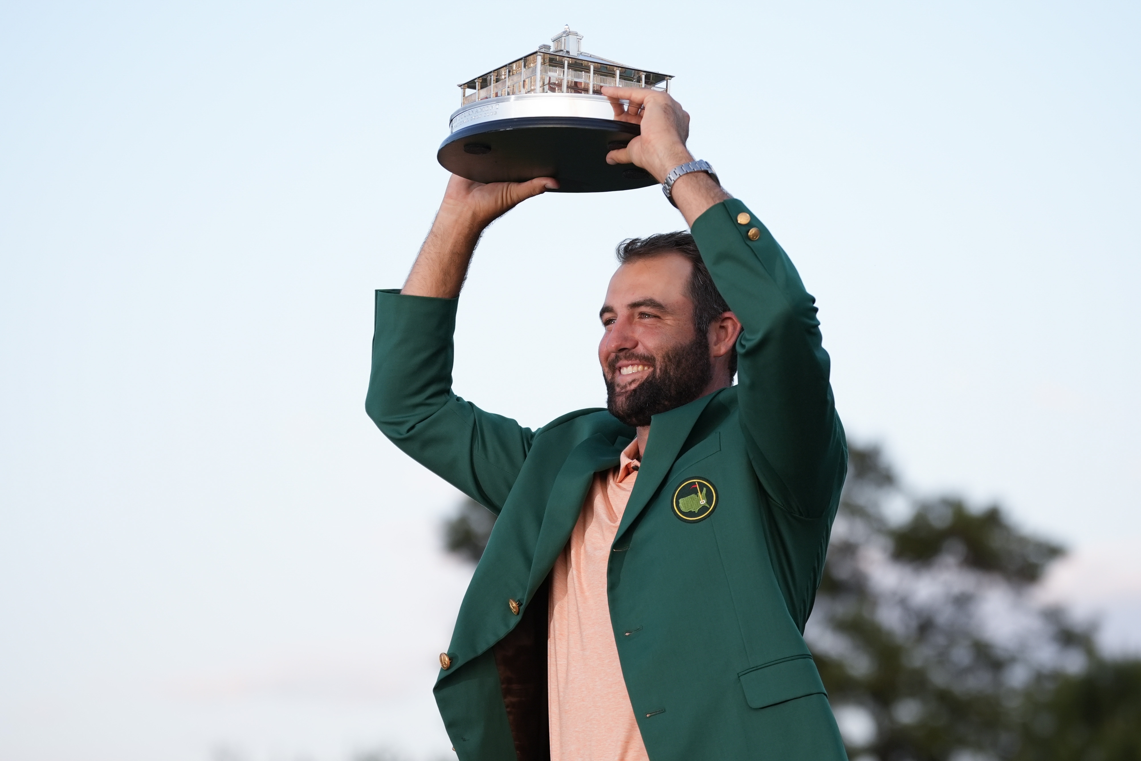 Scottie Scheffler holds the trophy after winning the Masters golf tournament at Augusta National Golf Club Sunday, April 14, 2024, in Augusta, Ga. 