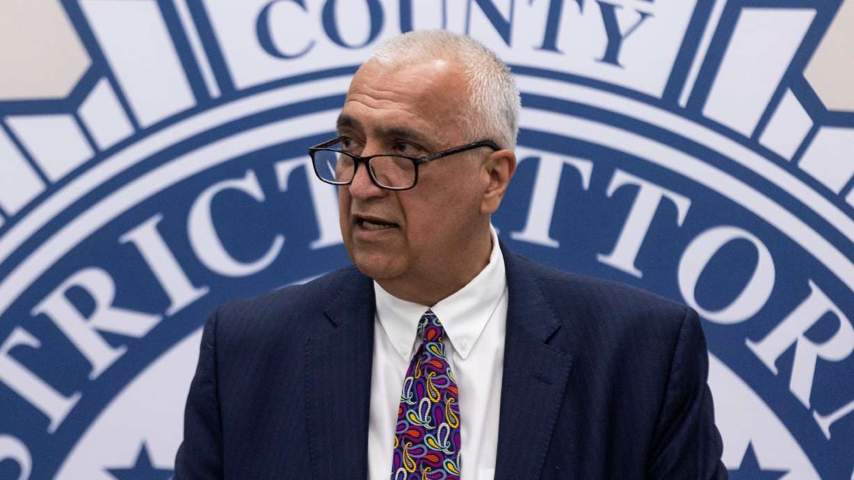 District Attorney Sim Gill speaks in Salt Lake City on April 15. Gill's office on Friday cleared two police officers in the case of a man who died of overdose after being handcuffed.
