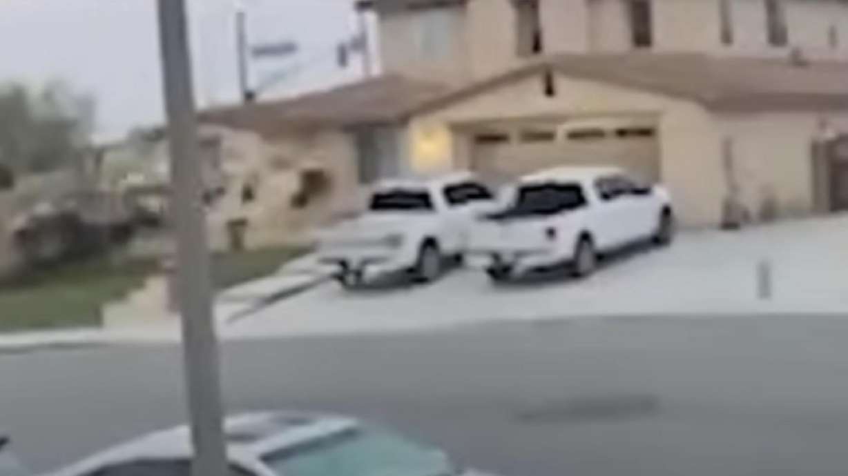 Home security footage captures a vehicle sailing into the garage of a California home.