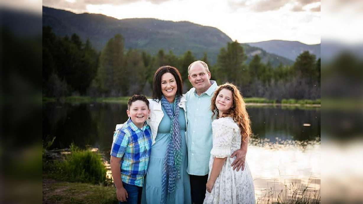 Mark Ewell is with his wife, Wendy, and children. Mark Ewell died April 2, after sacrificing his life to save his son in a snowmachine accident in Island Park, Idaho.
