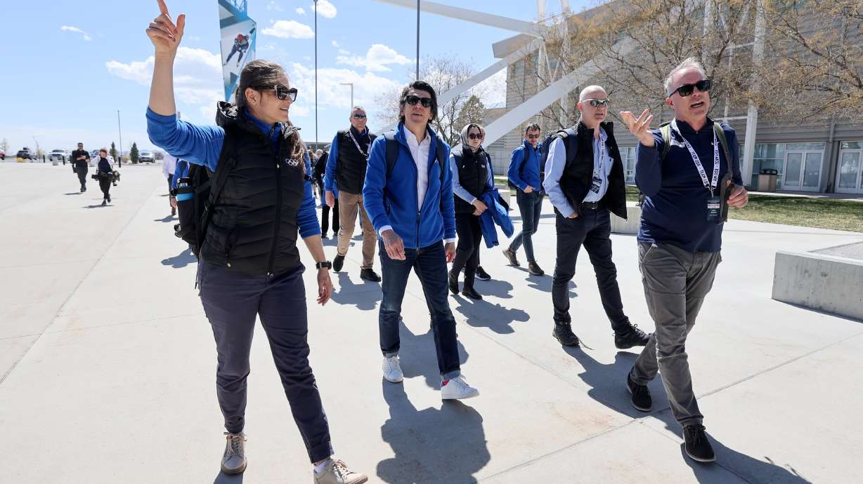 Danka Bartekova, Christophe Dubi, and Colin Hilton arrive with members of the International Olympic Committee’s Future Host Commission, IOC, U.S. Olympic and Paralympic leaders to tour sites in consideration for the 2034 Games in Kearns on Friday.