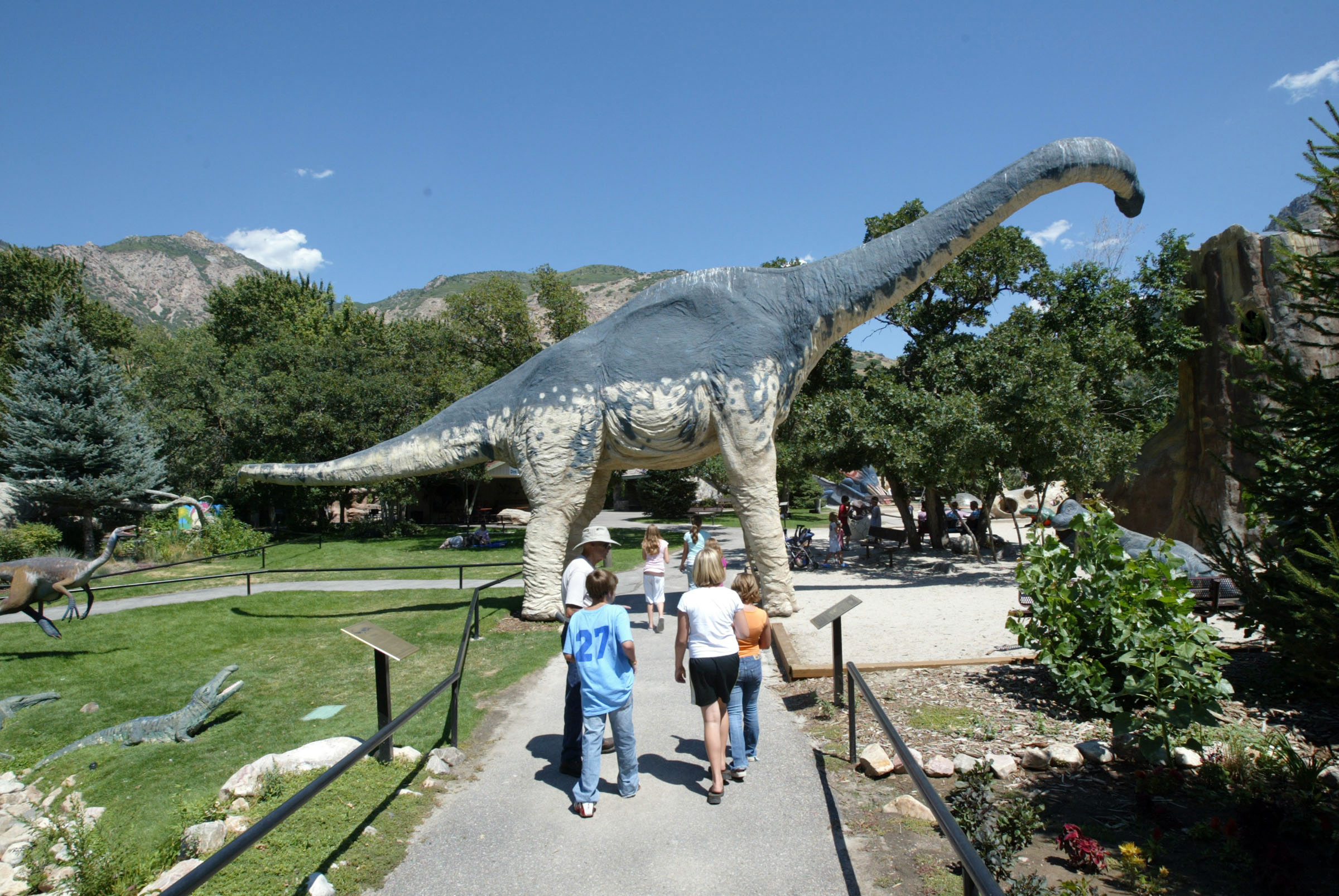 Patrons tour the George S. Eccles Dinosaur Park in Ogden on Aug. 2, 2006.