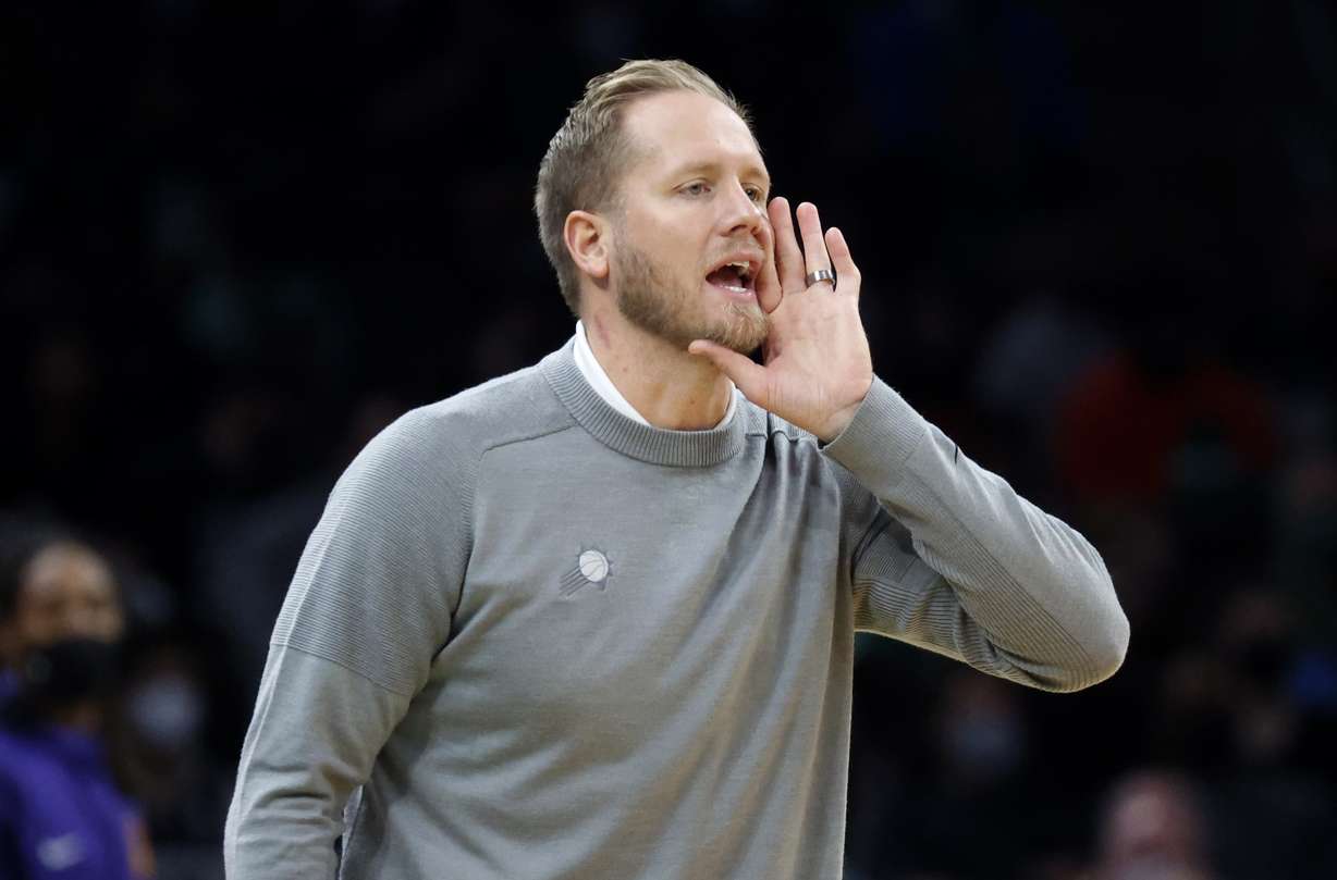 Phoenix Suns acting head coach Kevin Young yells to his team during the first half of an NBA basketball game against the Boston Celtics, Friday, Dec. 31, 2021, in Boston. BYU hired Phoenix Suns associate head coach Kevin Young to replace Mark Pope, who left to coach Kentucky, the school's athletic director announced Tuesday, April 16, 2024.