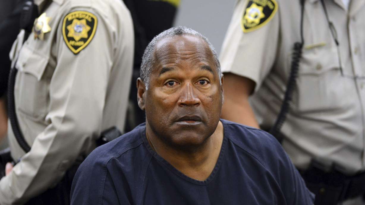FILE - In this May 14, 2013, file photo, O.J. Simpson sits during a break on the second day of an evidentiary hearing in Clark County District Court in Las Vegas. O.J. Simpson's attorney Malcolm LaVergne is now handling the deceased former football star, actor and famous murder defendant's financial estate.