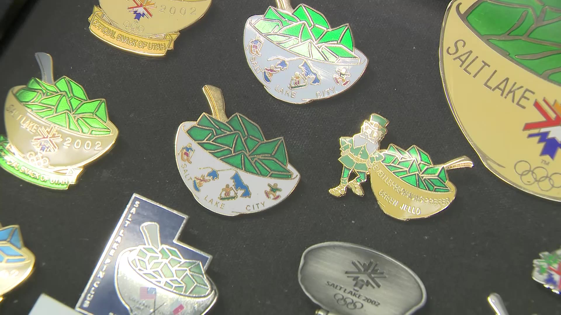 Jell-O pins from the 2002 Winter Games are displayed in the classroom.