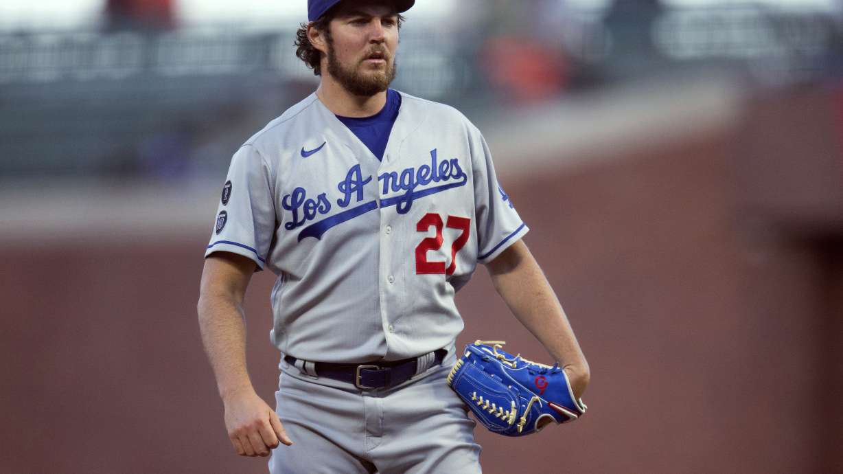 FILE - Los Angeles Dodgers starting pitcher Trevor Bauer looks toward home during the team's baseball game against the San Francisco Giants on May 21, 2021, in San Francisco. An Arizona woman who accused former pitcher Bauer of sexual assault has been charged with defrauding the baseball player. An indictment unsealed Monday, April 15, 2024, in Maricopa County Superior Court identifies Bauer as one of two victims. It charges the woman with fraud and theft by extortion, both felonies, but doesn't provide specific details about the alleged fraudulent scheme.