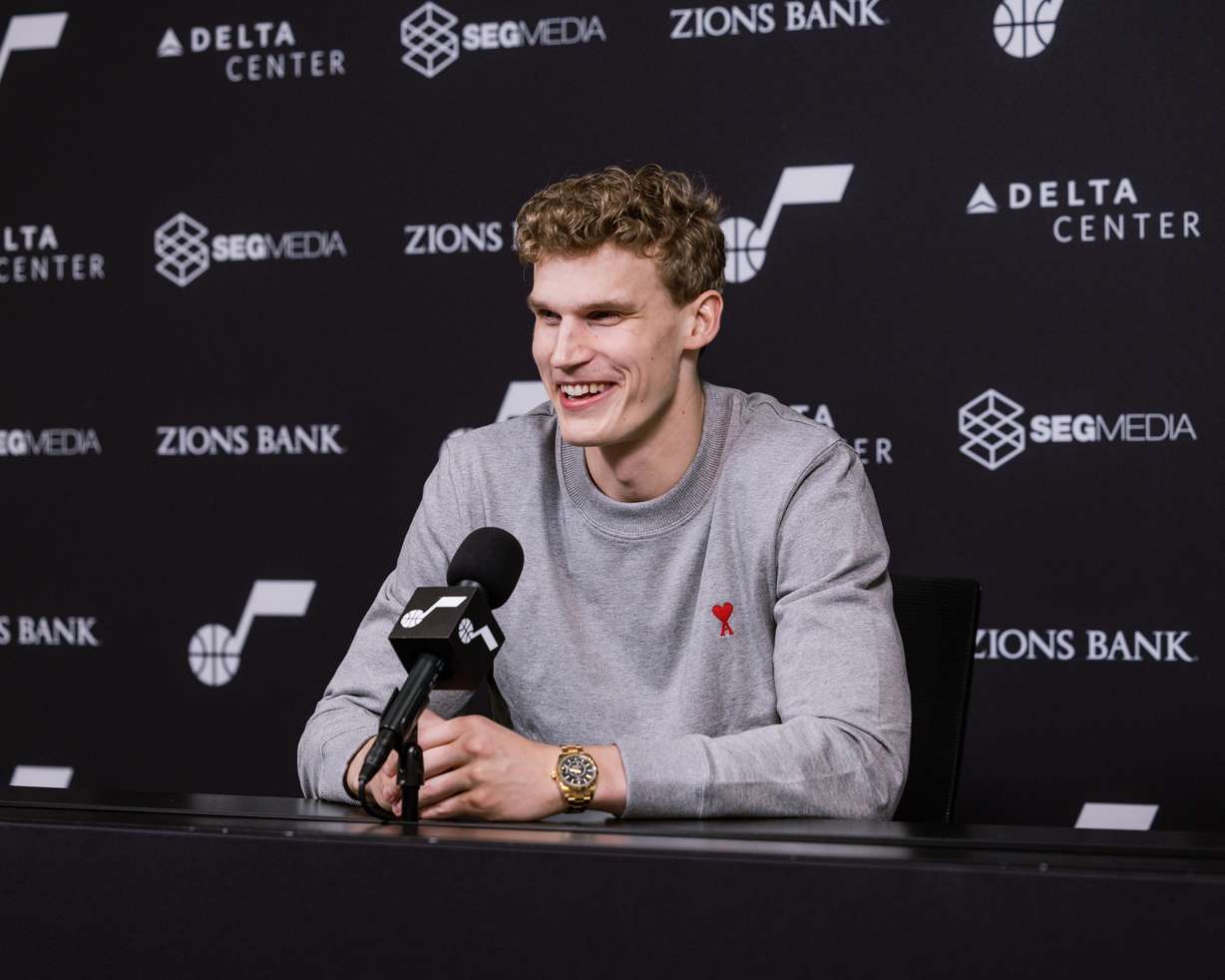 Lauri Markkanen speaks to reporters during an end-of-season media session.