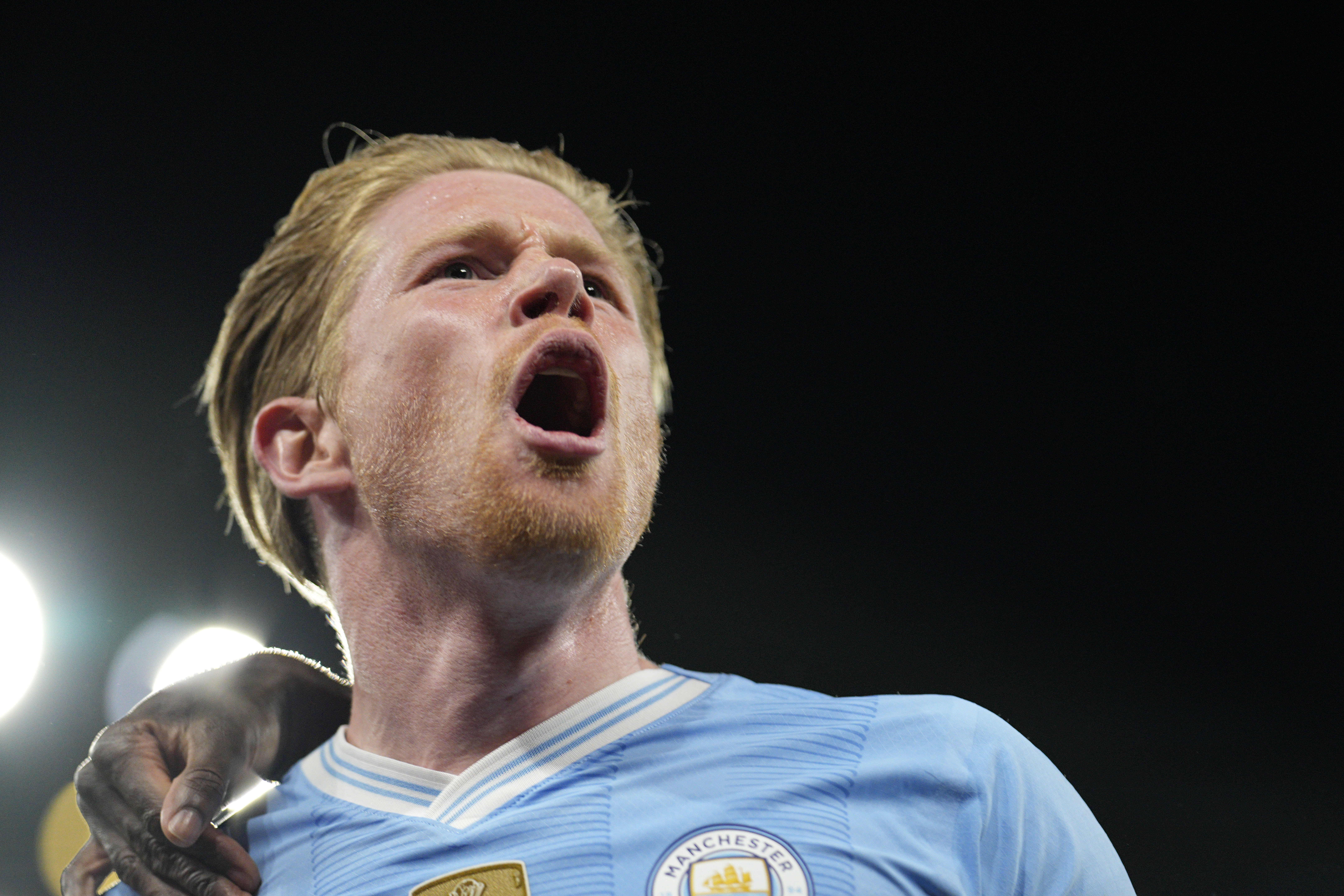Manchester City's Kevin De Bruyne celebrates after scoring his side's opening goal during the Champions League quarterfinal second leg soccer match between Manchester City and Real Madrid at the Etihad Stadium in Manchester, England, Wednesday, April 17, 2024.