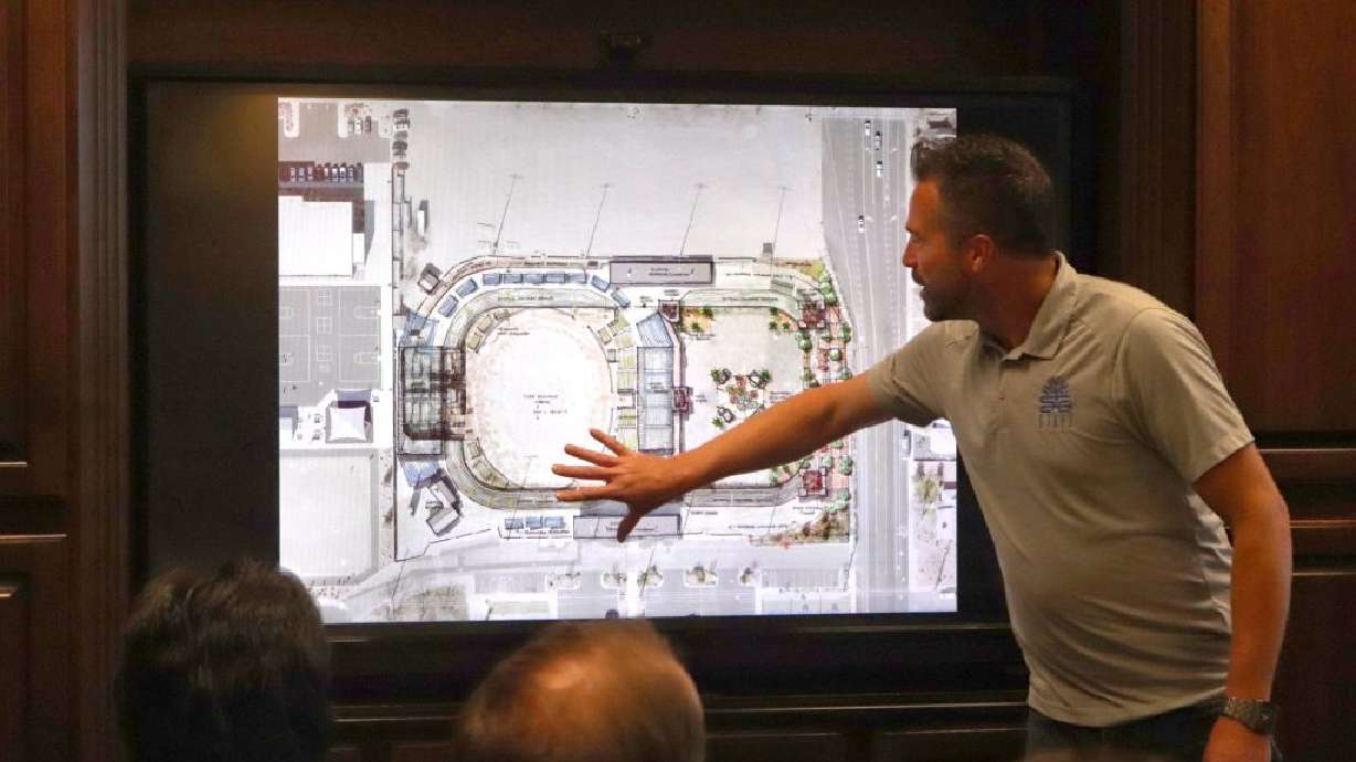 Mark Goble of the city of St. George’s Parks and Community Services Department points at changes to be made to the Dixie Sunbowl as a part of a planned renovation, St. George, Thursday.