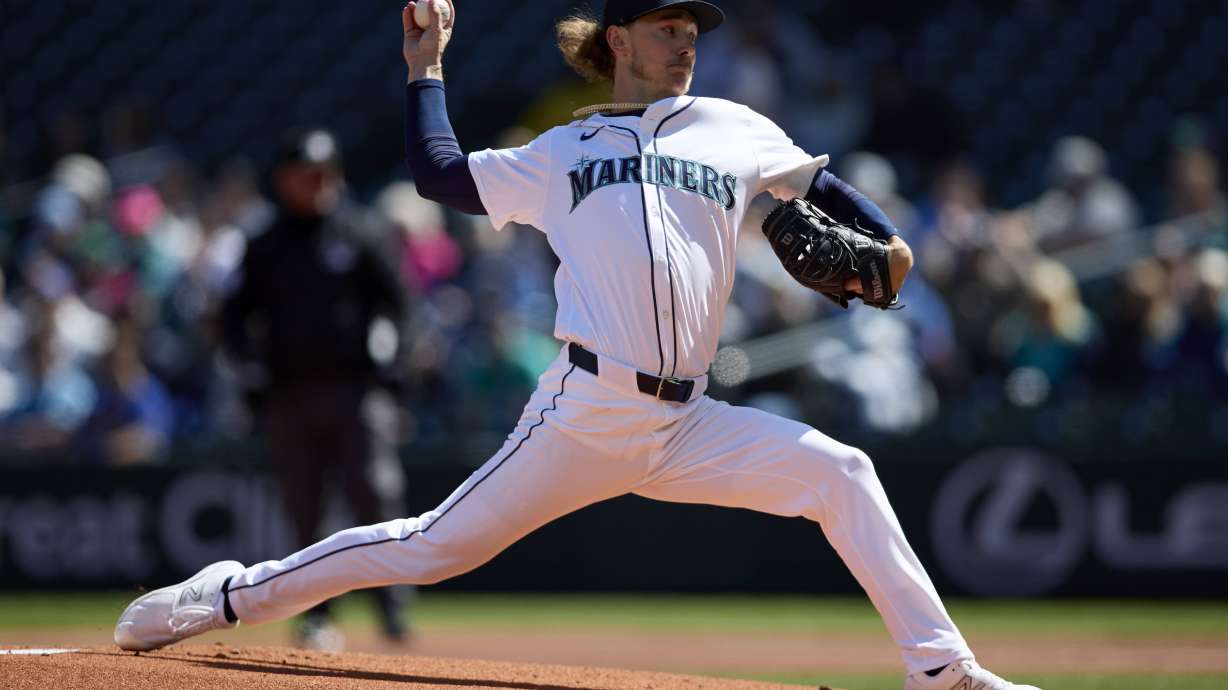 Seattle Mariners pitcher Bryce Miller throws to a Cincinnati Reds batter during the first inning of a baseball game, Wednesday, April 17, 2024, in Seattle.