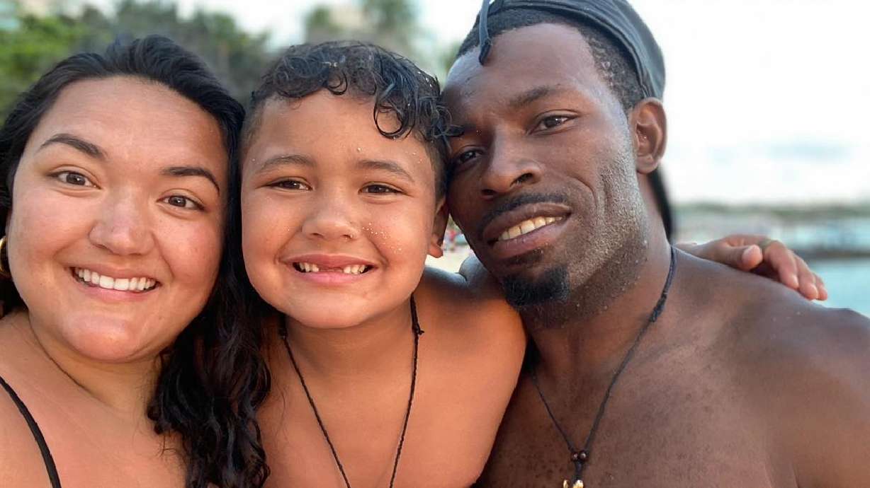 Cecillee Cummings, left, her son K.C., and Bryan Izeman, have accused their neighbor Kathryn Smith of assault, battery and other complaints stemming from a series of interactions in which they say Smith used expletives and racial slurs toward their son.