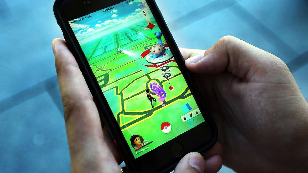 Austin Batchelor plays Pokemon GO at the Capitol in Salt Lake City on Monday, July 11, 2016. Pokemon GO just got an update. Everyone hates it.