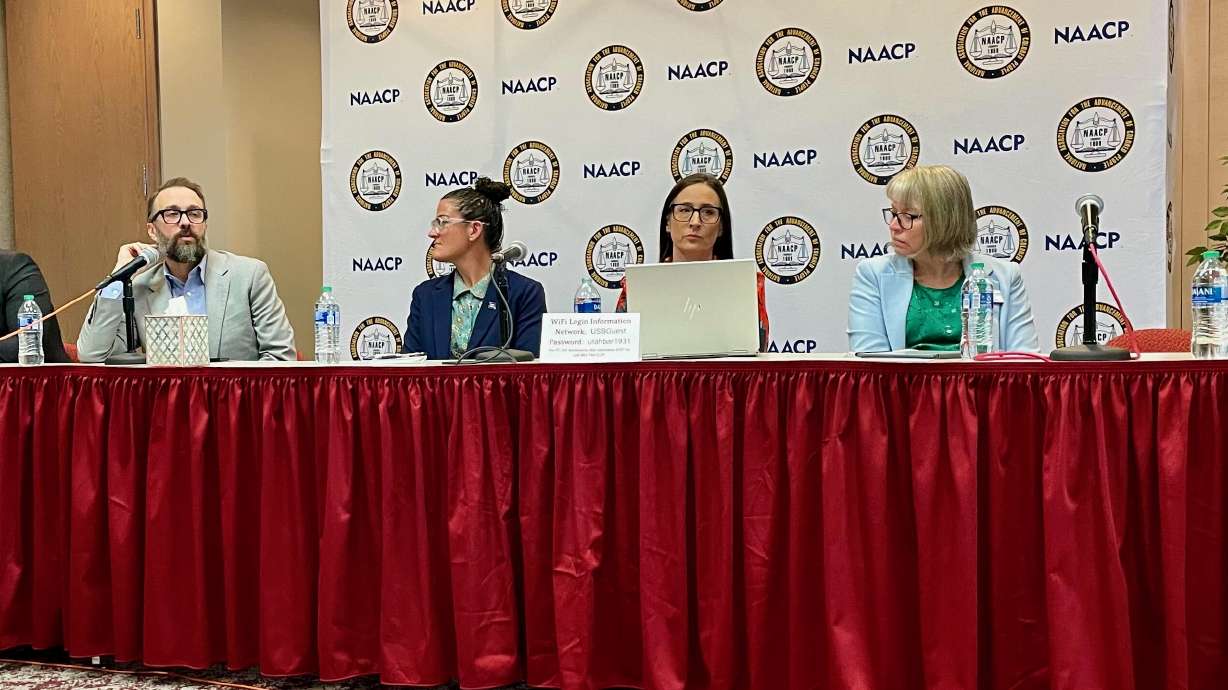 Geoffrey Landward, Utah commissioner of higher education, addresses HB261 at an NAACP Salt Lake Branch education forum in Salt Lake City on Wednesday. At the table with him are Sarah Reale, Holly Bell and LeAnn Wood.