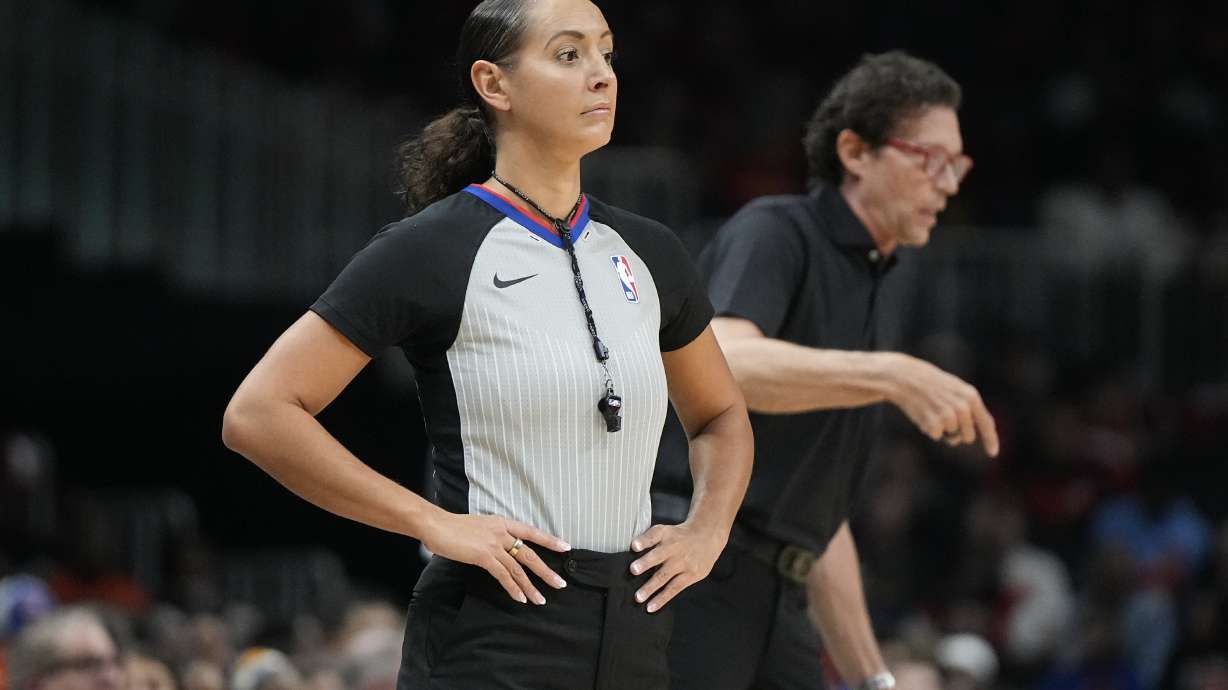 FILE - Referee Ashley Moyer-Gleich (13) waits for play during the first half of an NBA basketball game between the Atlanta Hawks and the New York Knicks, Friday, Oct. 27, 2023, in Atlanta. The NBA announced its first-round playoff referees on Friday, April 18, 2024, and Ashley Moyer-Gleich became the first woman selected for the postseason since 2012. Moyer-Gleich got the nod in her sixth NBA season.