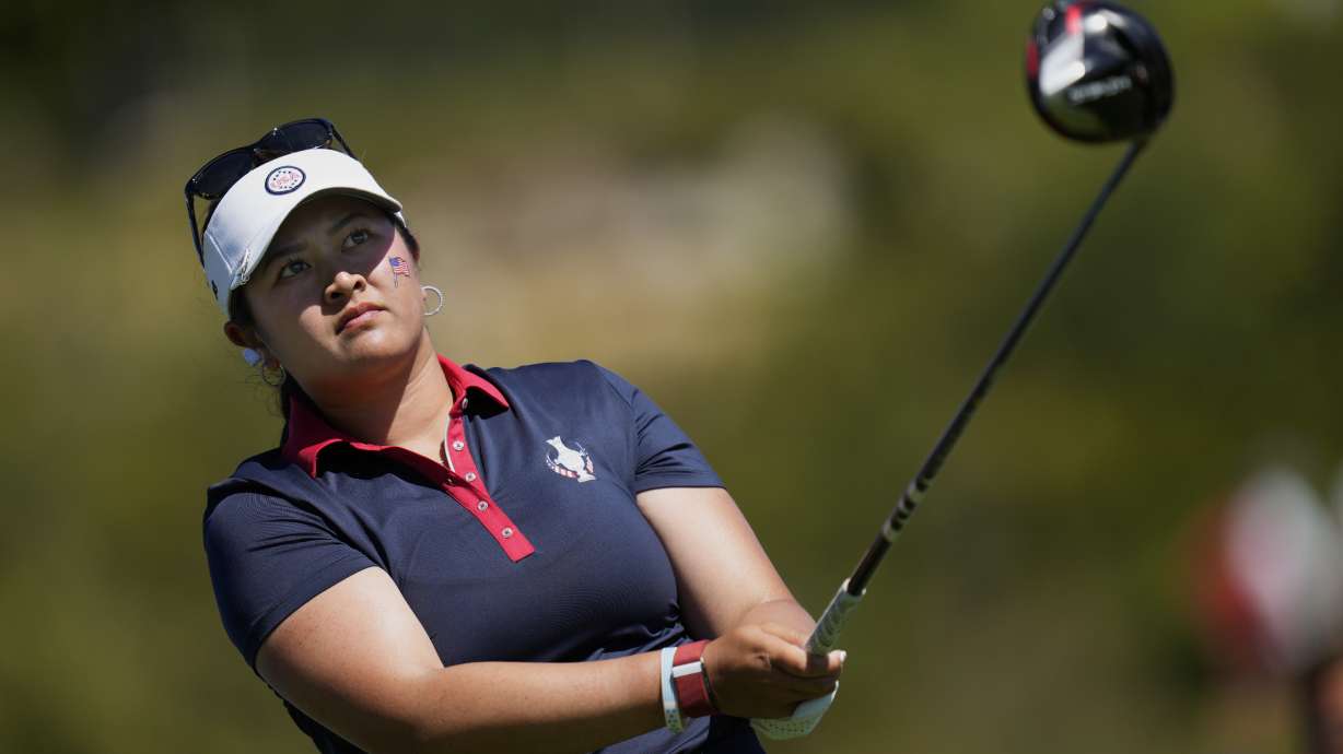 FILE - United States' Lilia Vu plays her tee shot on the 4th hole during her single match at the Solheim Cup golf tournament in Finca Cortesin, near Casares, southern Spain, Sunday, Sept. 24, 2023. Europe play the United States in this biannual women's golf tournament, which played alternately in Europe and the United States.