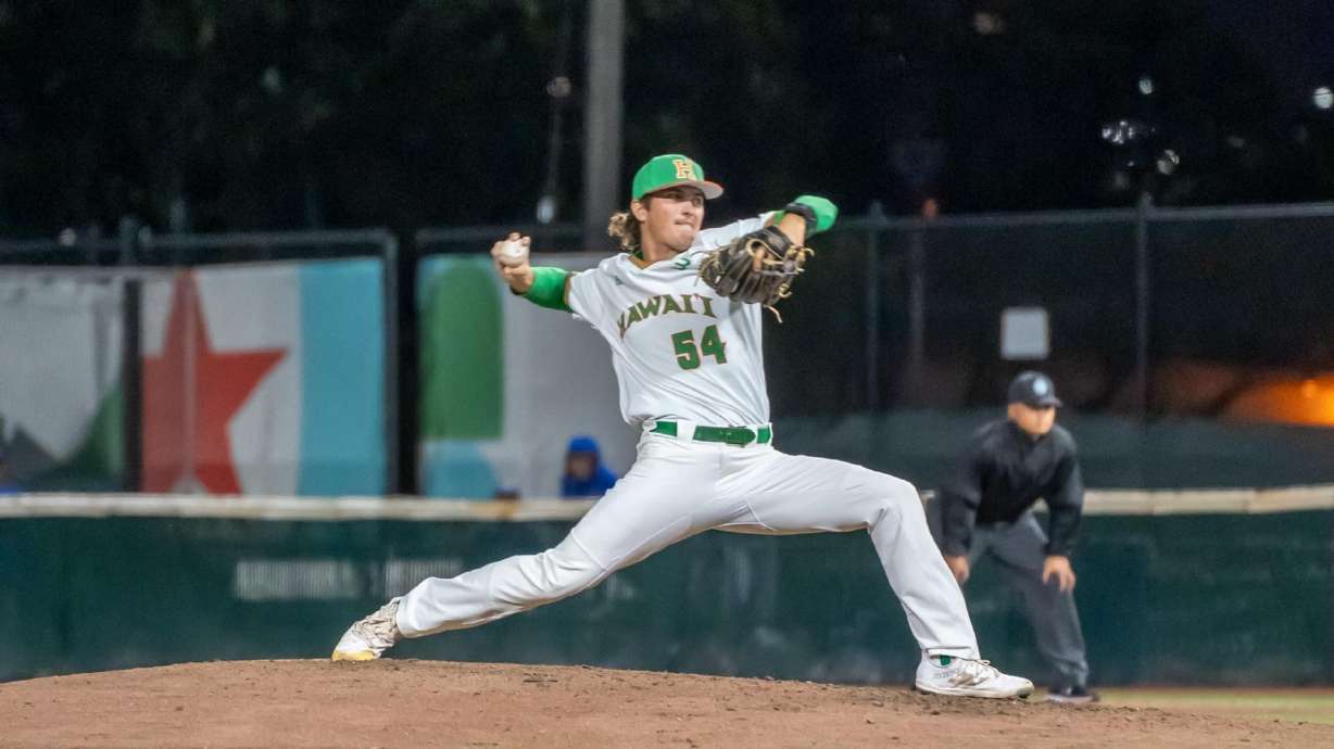 University of Hawaii and former Pleasant Grove High School pitcher Brayden Marx delivers his signature curveball in the Rainbow Warriors' win — his first collegiate victory — over Chaminade Tuesday.