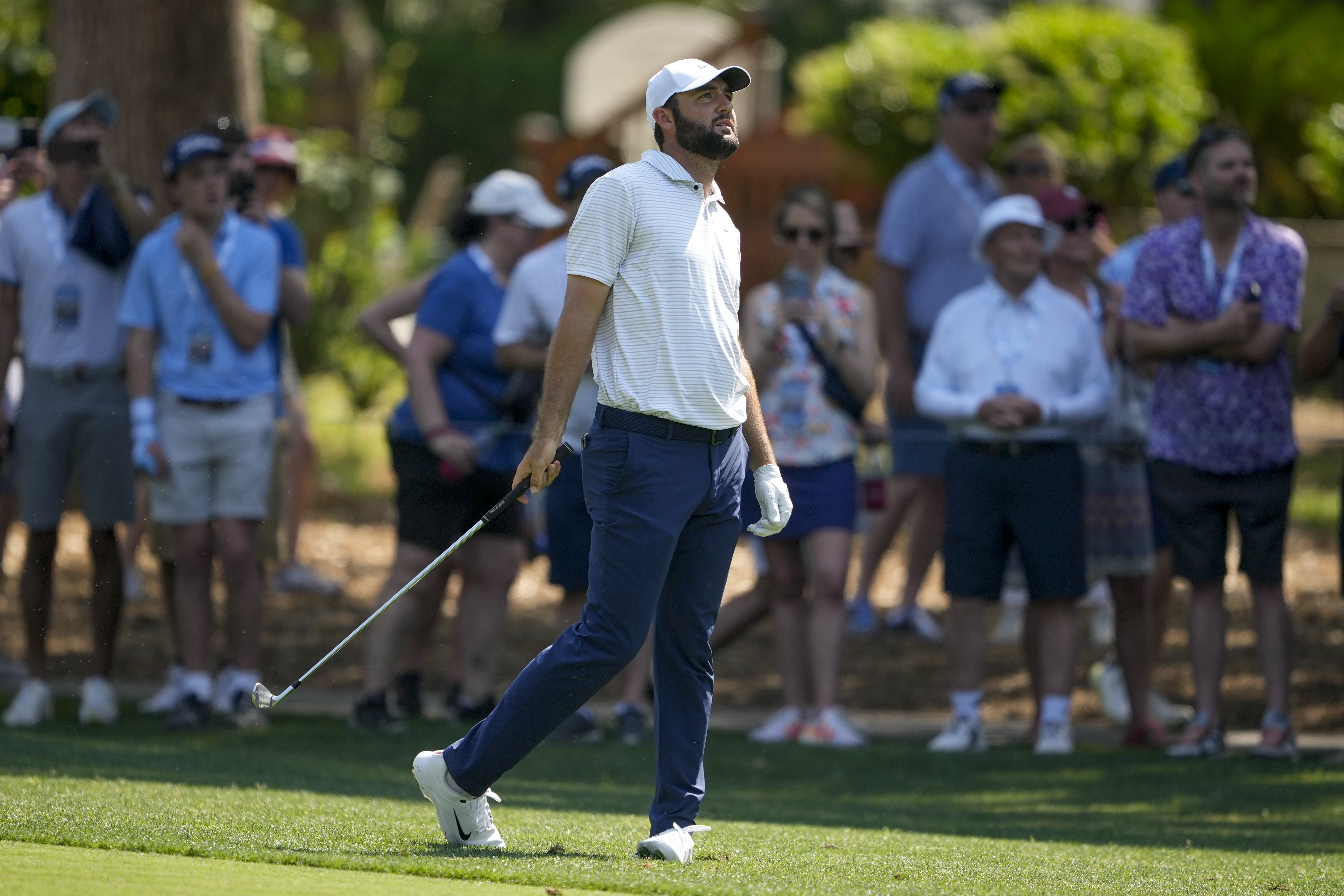 Scottie Scheffler hits from the fairway on the second hole during the first round of the RBC Heritage golf tournament, Thursday, April 18, 2024, in Hilton Head, S.C.