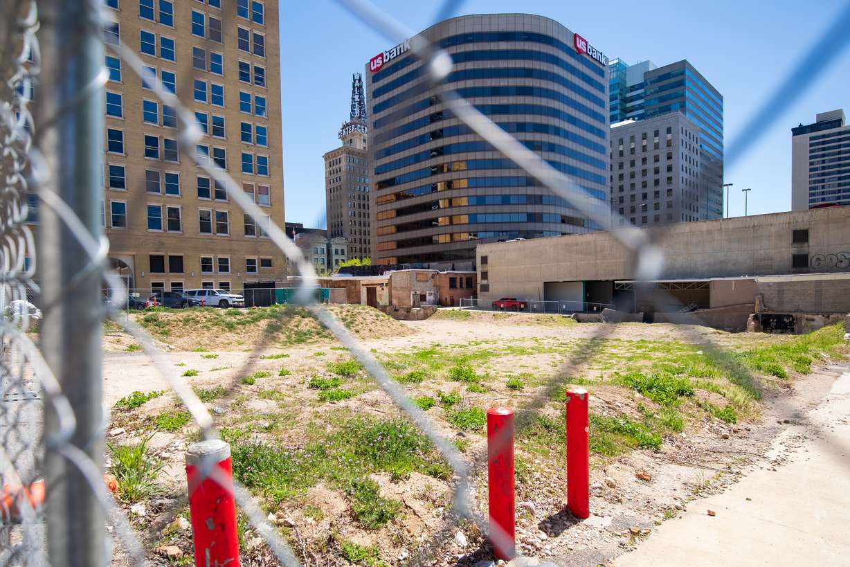 A fence blocks access to the lot where the Utah Pantages Theater once stood in downtown Salt Lake City on April 18. The lot was considered for the new site for Abravanel Hall, according to Salt Lake County emails released in a public records request.
