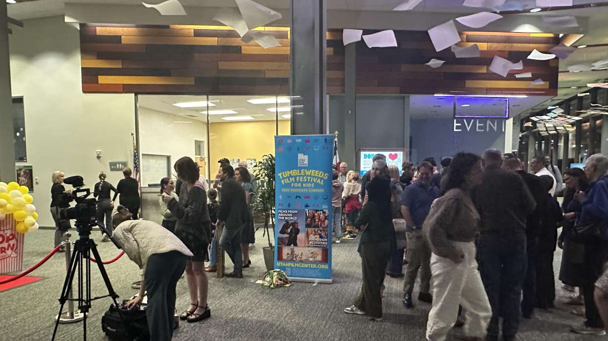 Participants of the Tumbleweeds Film Festival for Kids Film Competition gather in the lobby to socialize after an awards ceremony on Friday.