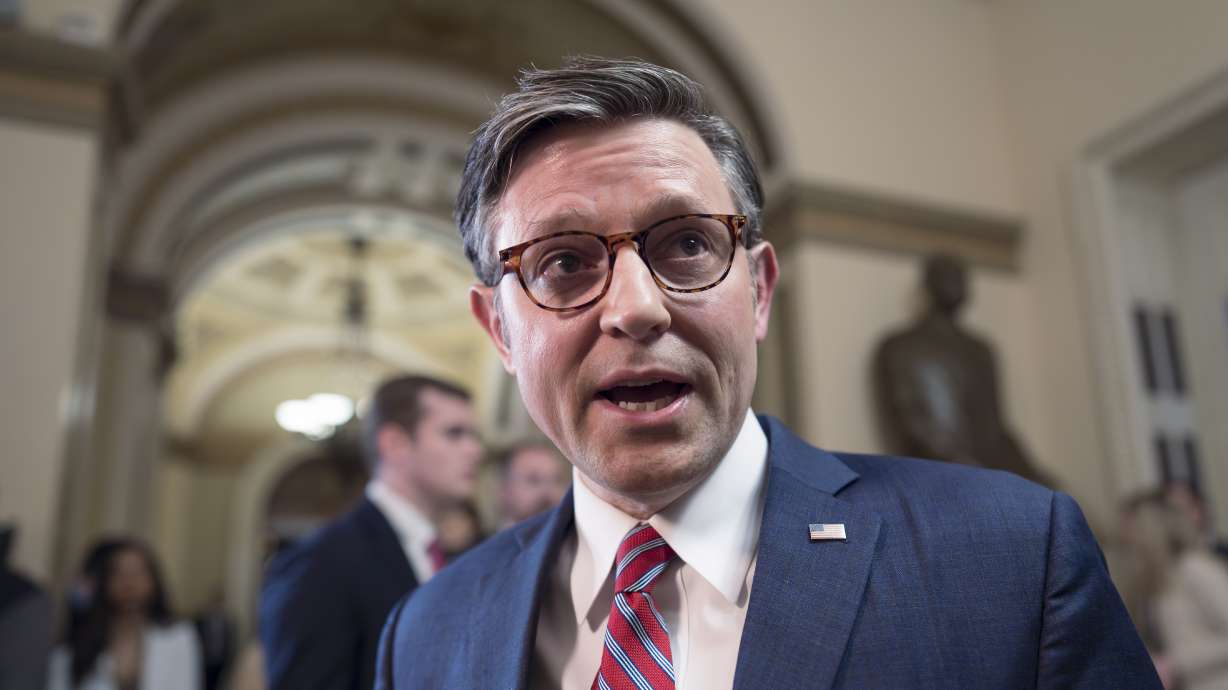 Speaker of the House Mike Johnson, R-La., talks to reporters at the Capitol in Washington on Friday. Johnson, putting his job on the line, relied on Democratic support this week to bring to the House floor a series of three votes on $95 billion in foreign aid for Ukraine, Israel and other U.S. allies, as well as a fourth on several other foreign policy proposals.