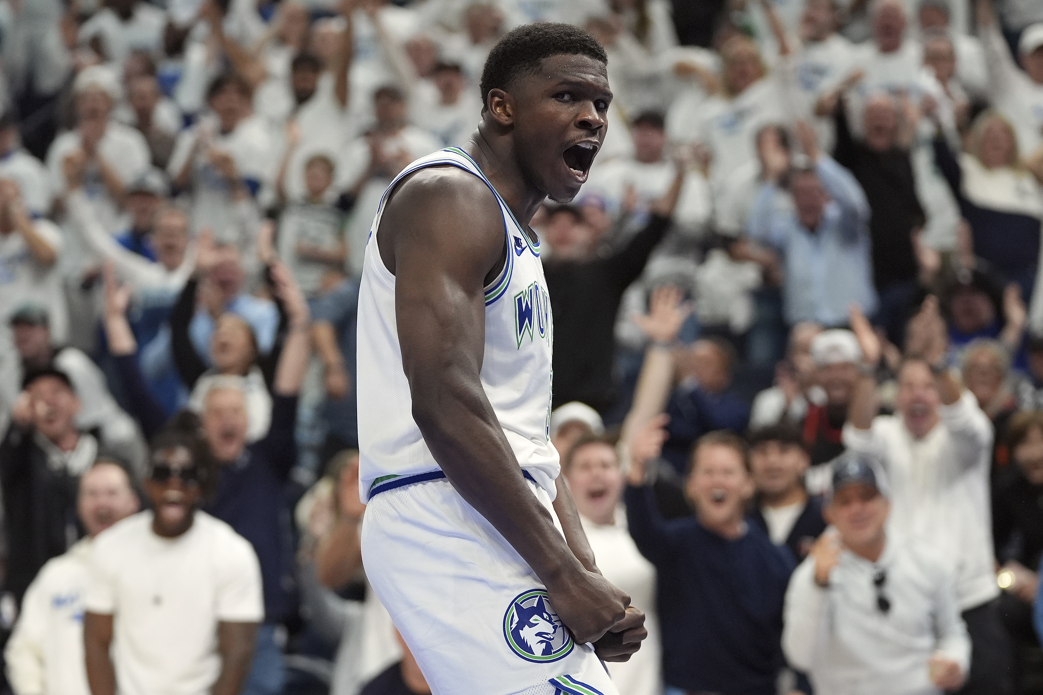 Minnesota Timberwolves guard Anthony Edwards celebrates after a dunk during the second half of Game 1 of an NBA basketball first-round playoff series against the Phoenix Suns, Saturday, April 20, 2024, in Minneapolis. 