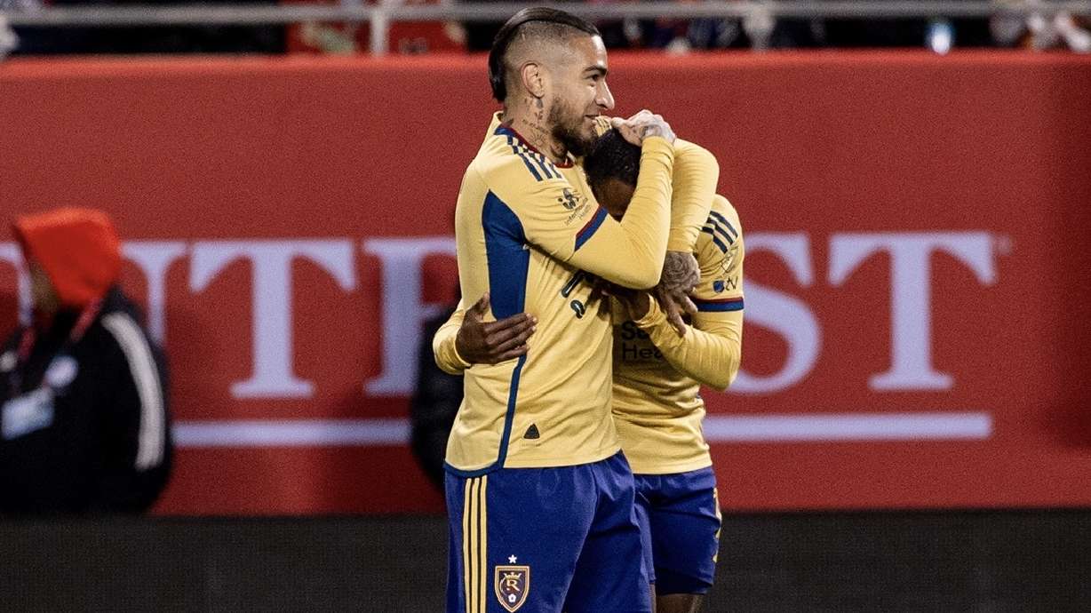 Chicho Arango, left, hugs Andres Gomez, right, to celebrate a goal in Chicago.