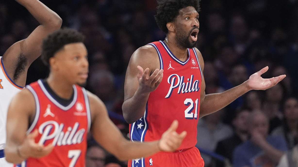 Philadelphia 76ers center Joel Embiid (21) and Kyle Lowry (7) react during the first half in Game 1 of an NBA basketball first-round playoff series against the New York Knicks, Saturday, April 20, 2024, at Madison Square Garden in New York.