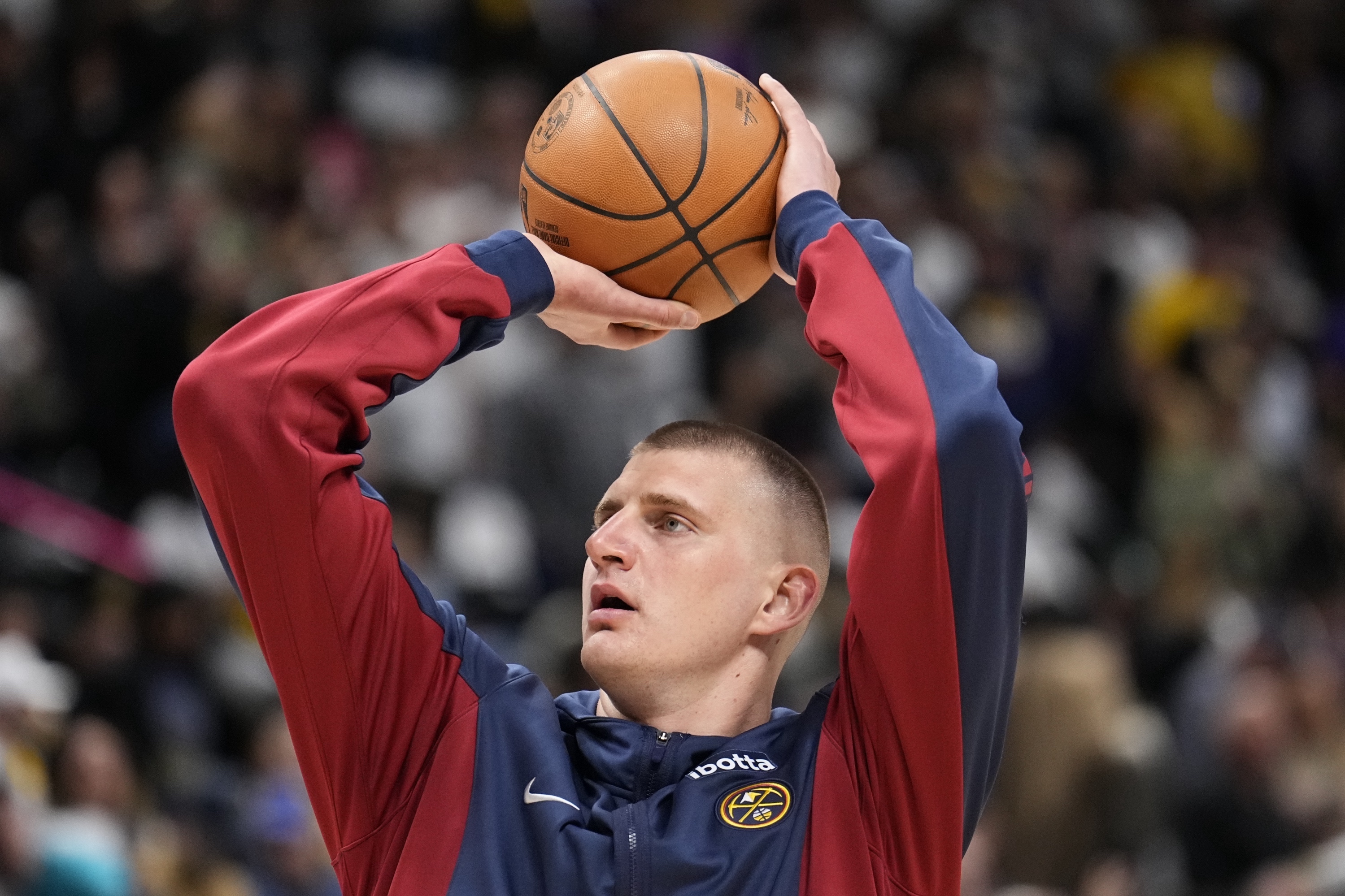 Denver Nuggets center Nikola Jokic warms up prior to Game 1 of an NBA basketball first-round play off game against the Los Angeles Lakers, Saturday, April 20, 2024, in Denver. 