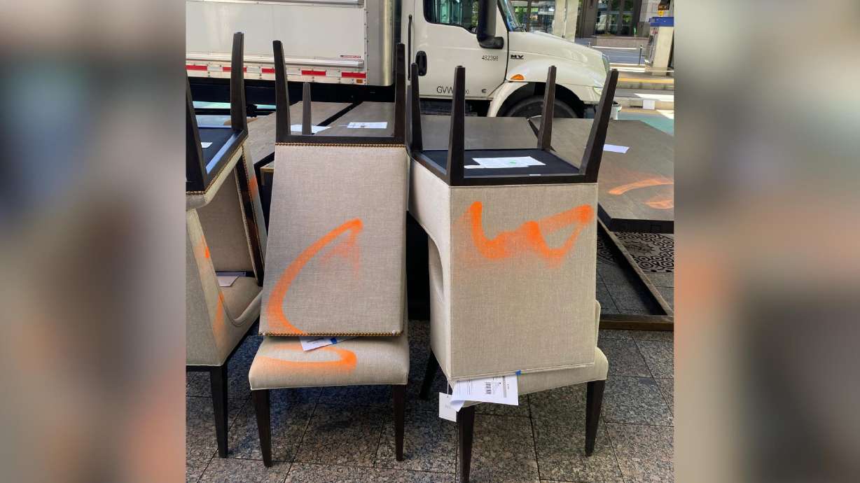 A man previously convicted on a graffiti charge was arrested Sunday and accused of causing more than $34,000 in damage by spray-painting furniture waiting to be moved into a store at 50 S. Main in Salt Lake City.