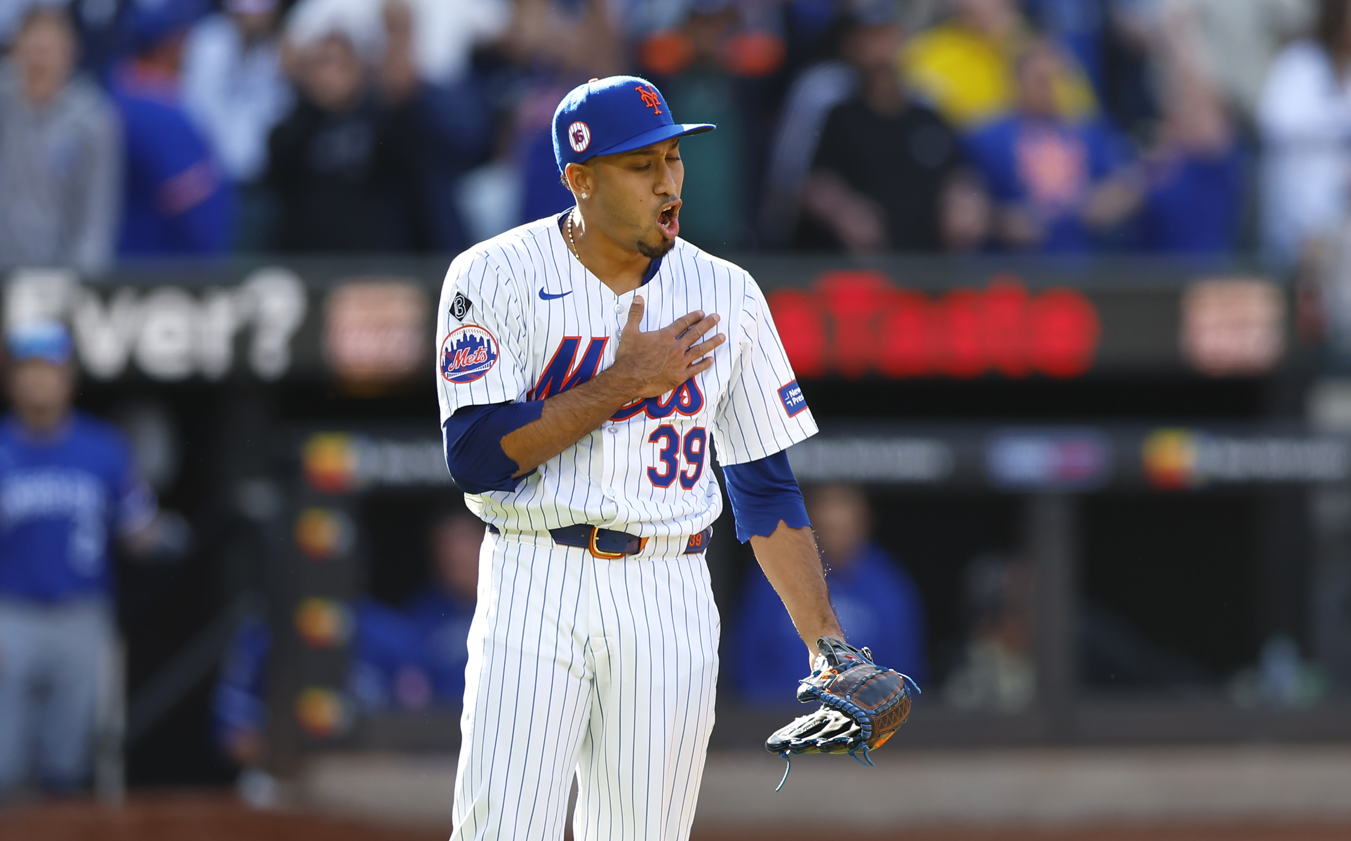 New York Mets pitcher Edwin Díaz (39) reacts after the New York Mets defeated the Kansas City Royals, Sunday, April 14, 2024, in New York. 