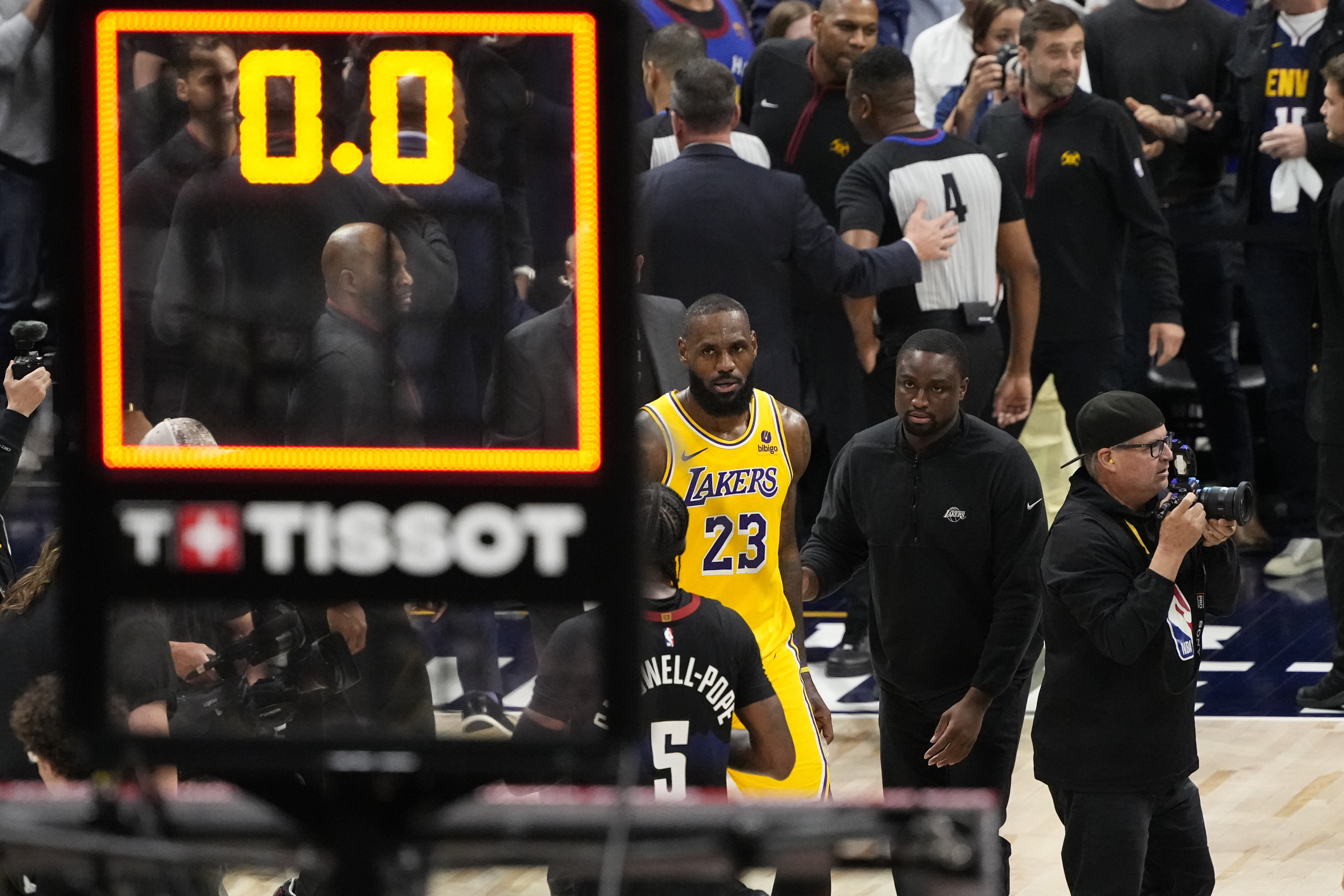 Los Angeles Lakers forward LeBron James (23) walks off the court after a loss to the Denver Nuggets in Game 2 of an NBA basketball first-round playoff series Monday, April 22, 2024, in Denver.