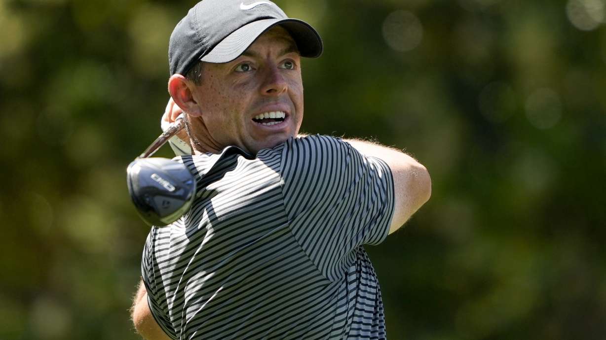Rory McIlroy, of Northern Ireland, watches his tee shot on the sixth hole during the second round of the RBC Heritage golf tournament, Friday, April 19, 2024, in Hilton Head Island, S.C.