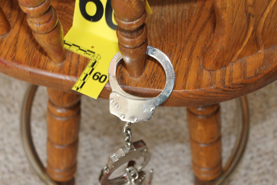 The wooden chair and handcuffs on the scene of the Bingham County, Idaho home invasion on March 13.