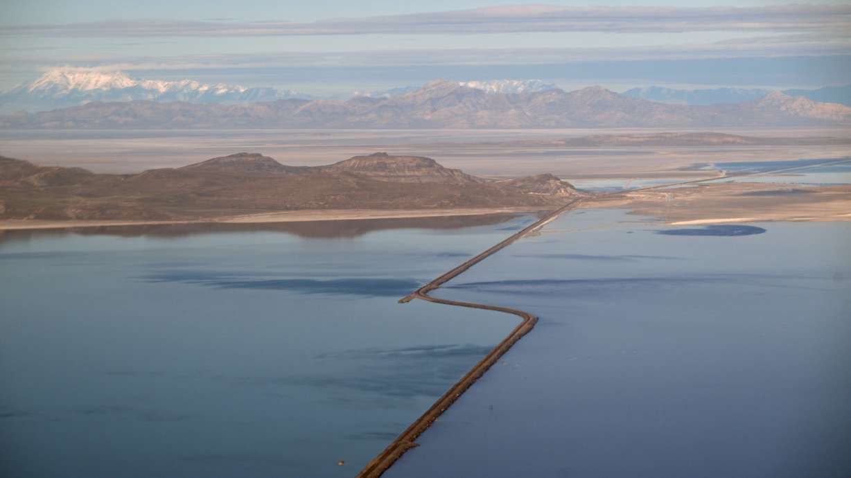 The Lucin Cutoff is seen in a flight over the Great Salt Lake on April 9. Experts say the Great Salt Lake isn't the leading cause of dust in Utah.