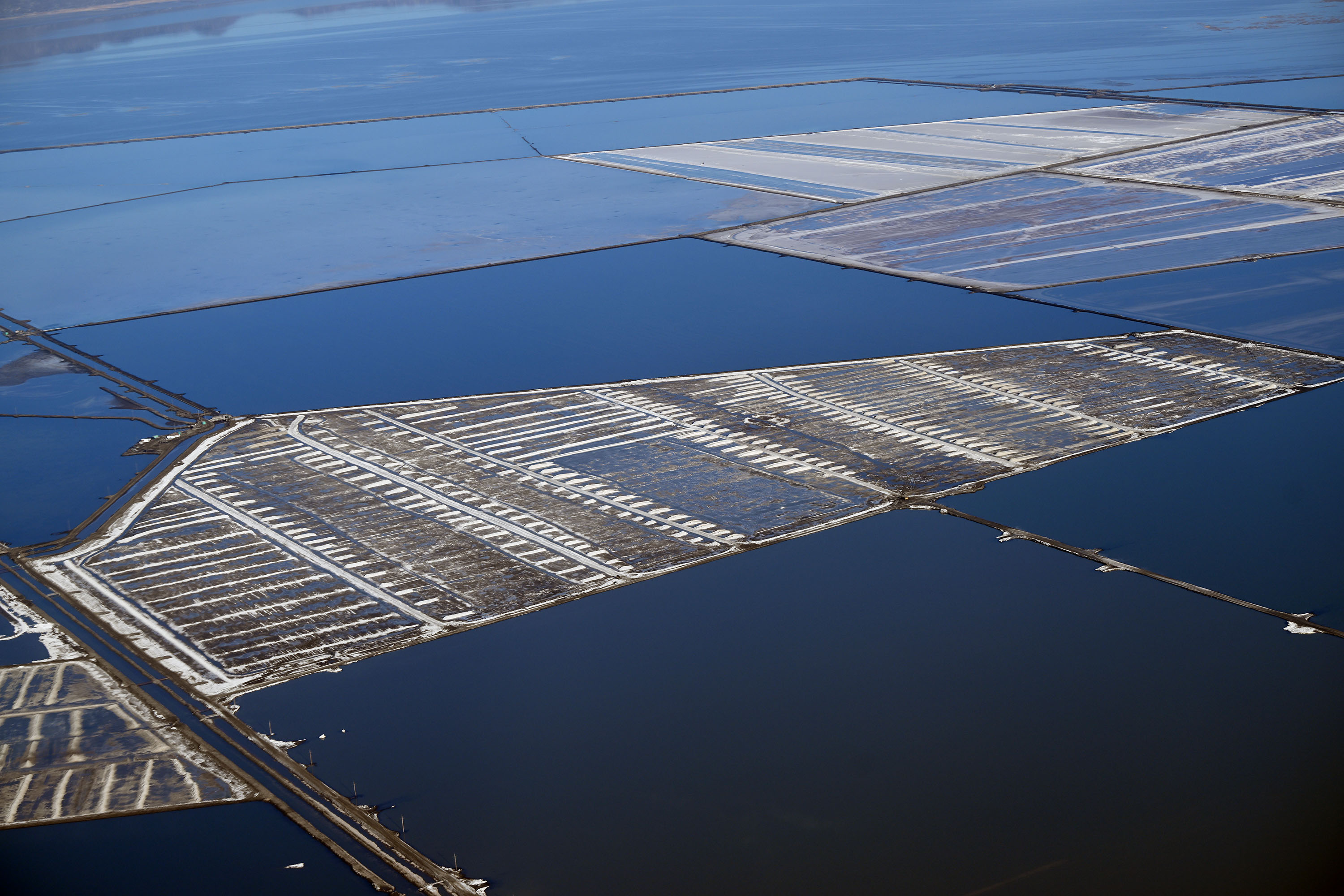 Mineral drying ponds are visible during an EcoFlight over the Great Salt Lake on April 9.