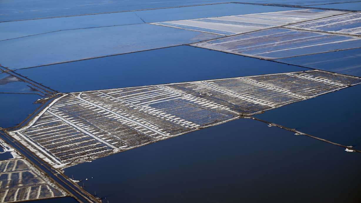 Mineral drying ponds are visible over the Great Salt Lake on April 9. The Great Salt Lake Commissioner's Office believes the lake may have reached its spring runoff peak at about 4,195.2 feet elevation.