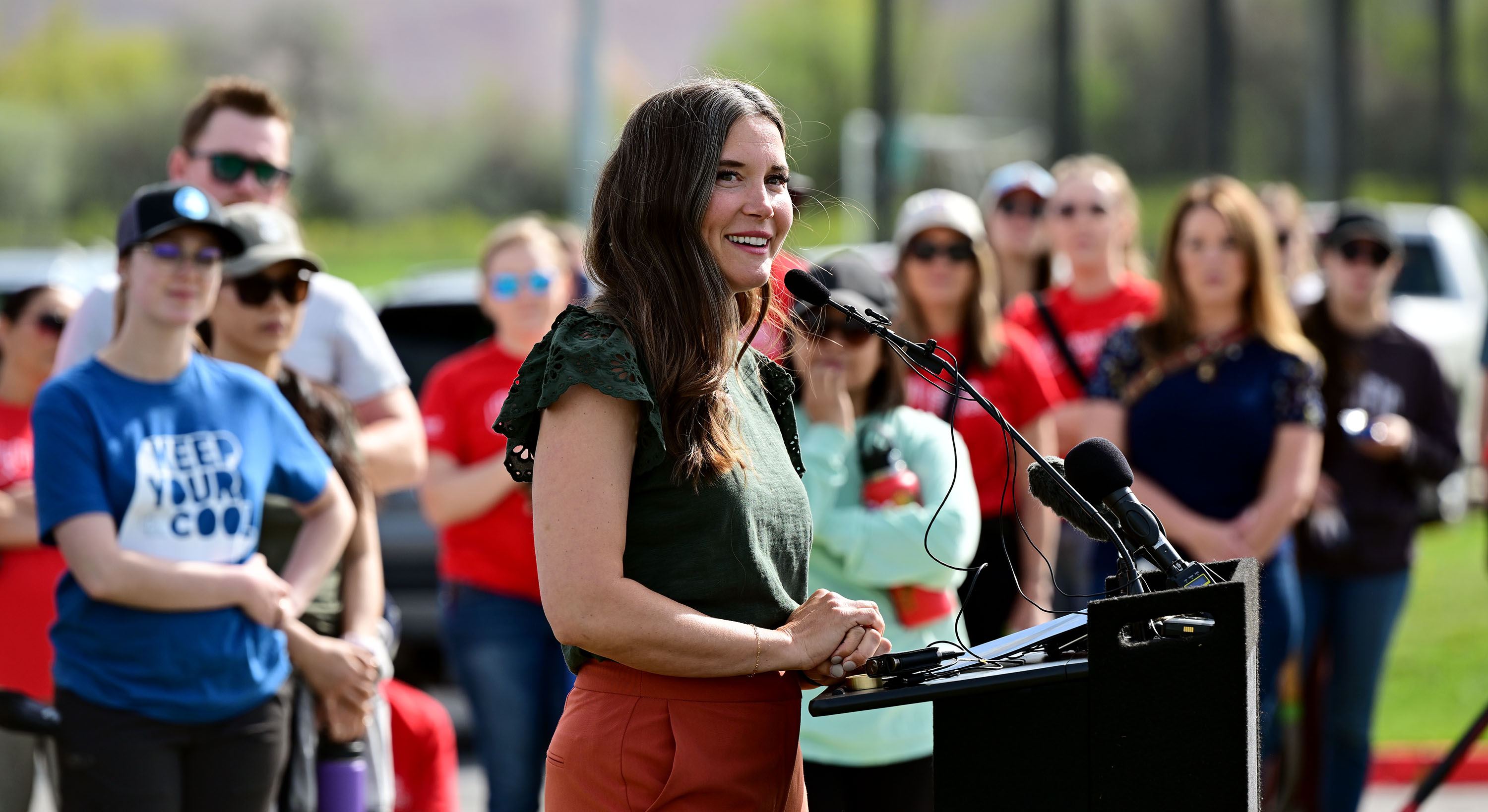 Salt Lake City Mayor Erin Mendenhall speaks to the assembled volunteers after the planting of the trees for an Earth Day and Arbor Day celebration. The Salt Lake City Department of Public Lands and other community volunteers combined for the celebration to plant more than 250 trees at the Regional Athletic Complex in Rose Park on Monday.