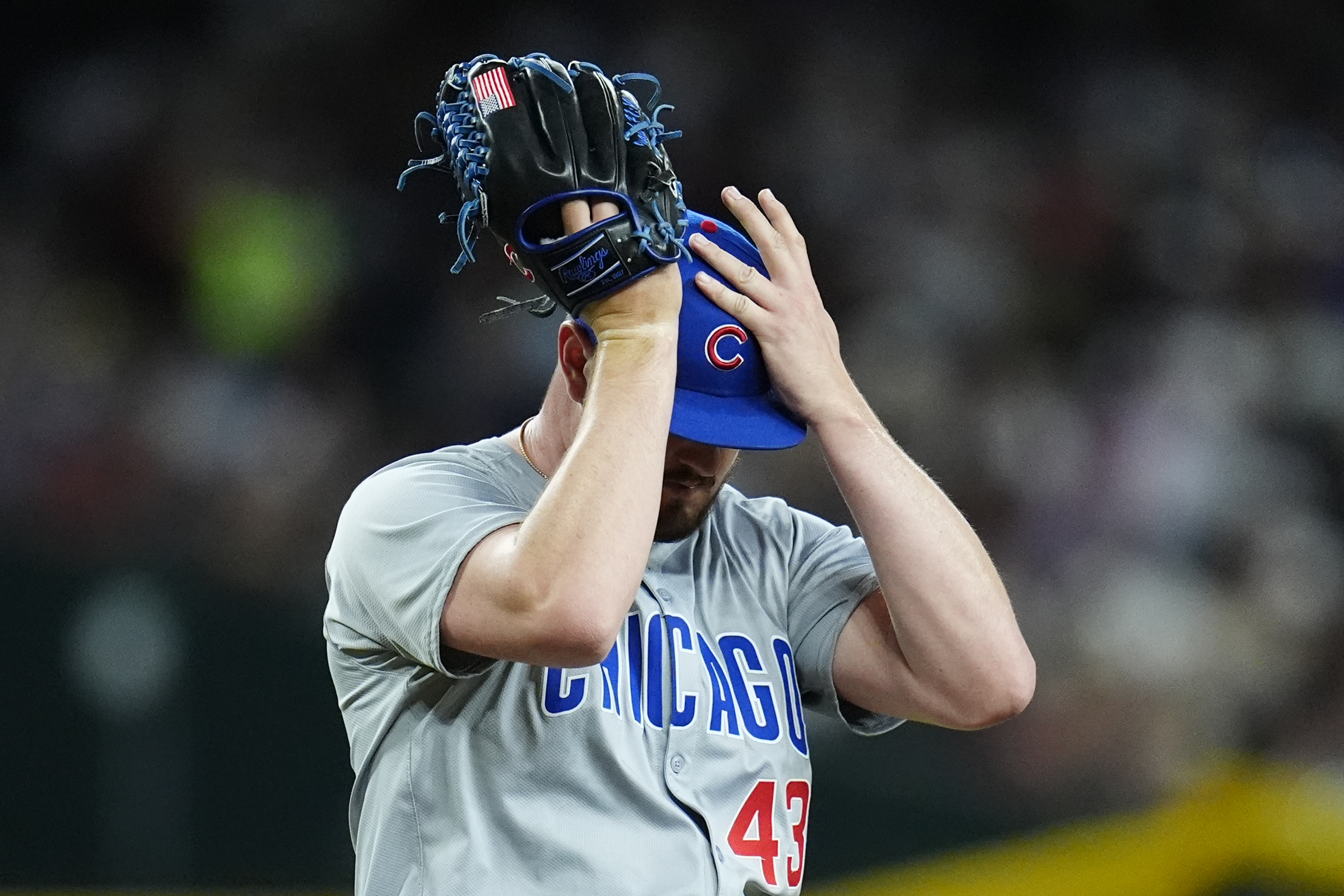 Chicago Cubs relief pitcher Luke Little pauses on the mound during the fifth inning of the team's baseball game against the Arizona Diamondbacks Tuesday, April 16, 2024, in Phoenix.