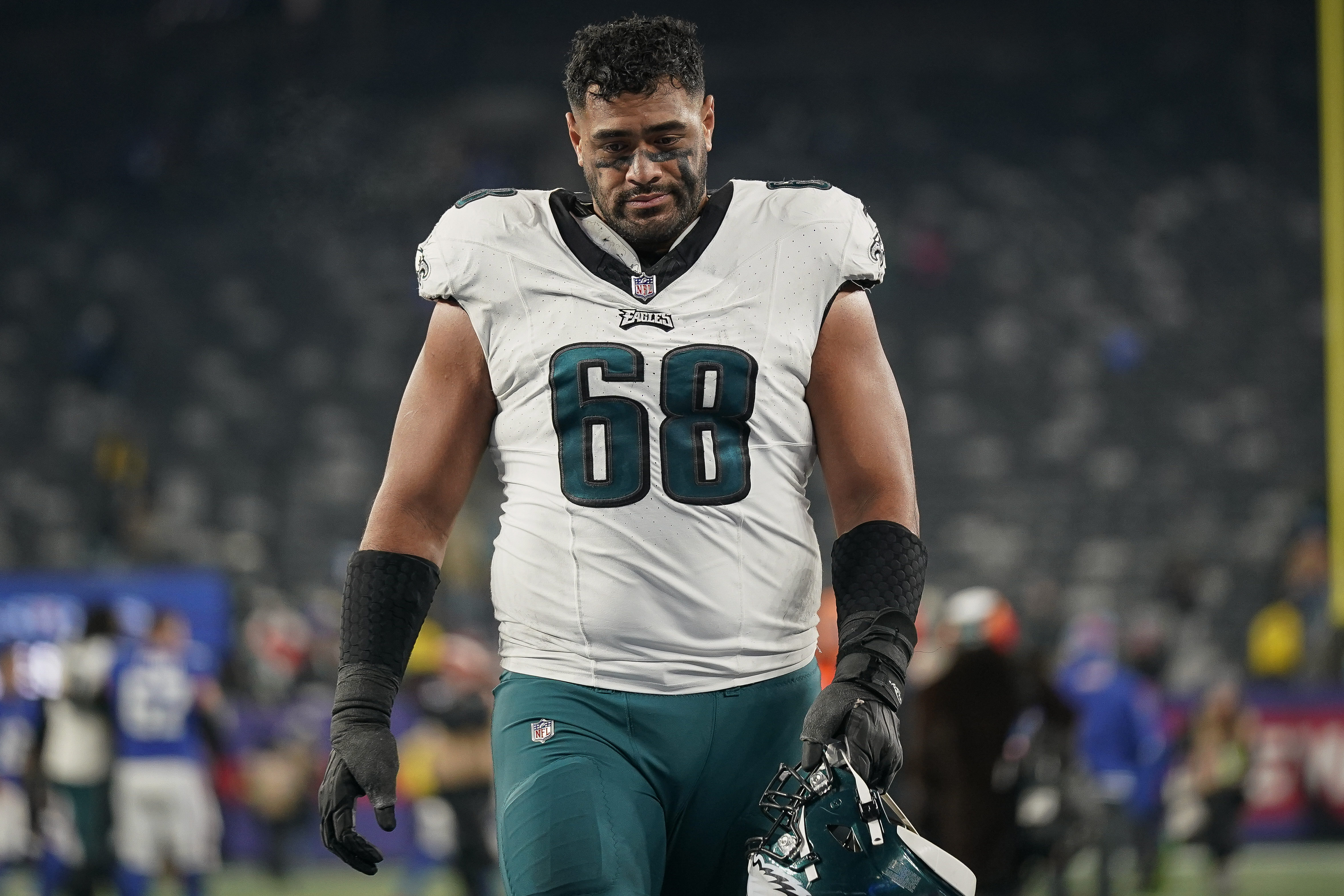 FILE - Philadelphia Eagles offensive tackle Jordan Mailata (68) after an NFL football game against the New York Giants, on Jan. 8, 2024, in East Rutherford, N.J. The NFL will expand its international search for talent by opening an academy in rugby-mad Australia to develop promising teenagers in the Asia-Pacific region into college and pro prospects. The NFL Academy will open in September for student athletes ages 12 to 18, following recruitment camps taking place this summer in Australia and New Zealand. Ahead with the NFL Draft, the announcement says the region is full of talent the likes of Philadelphia Eagles offensive tackle Jordan Mailata, a 6-foot-8 Australian who was deemed too big for rugby.