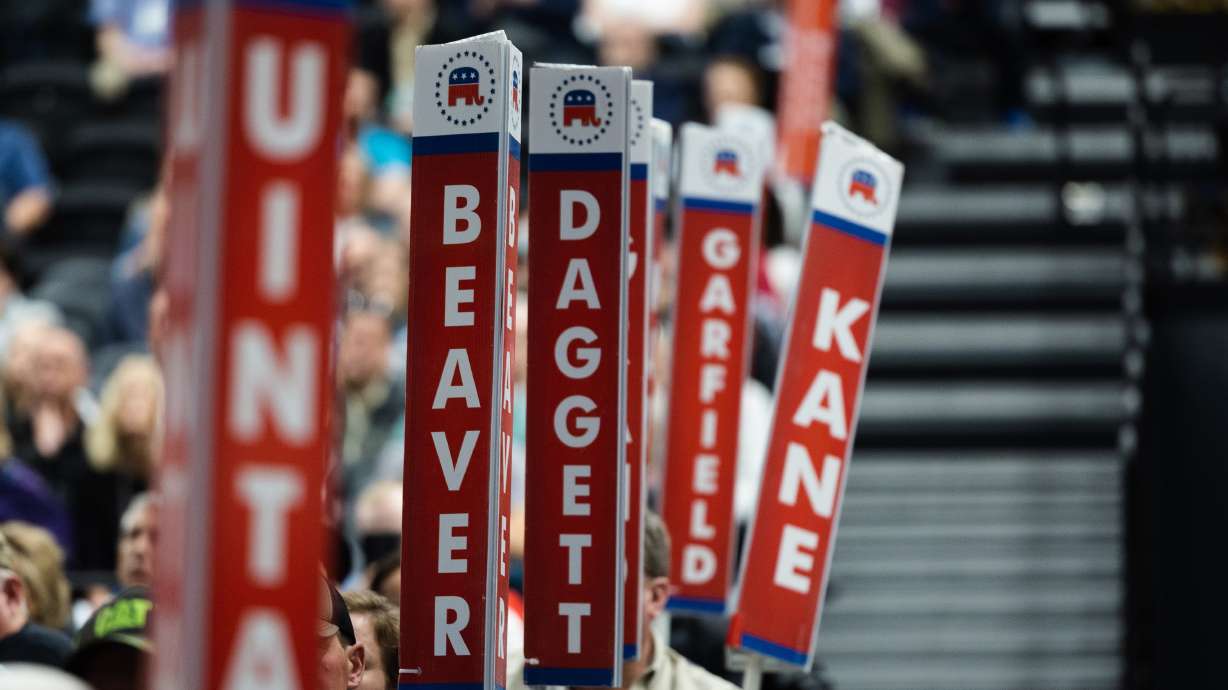 Signs displaying county names stand during the Utah Republican Party Organizing Convention at Utah Valley University in Orem on April 22, 2023. Here's what is at stake during Saturday's GOP and Democratic state conventions.