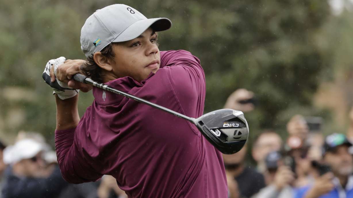FILE - Charlie Woods tees off during the final round of the PNC Championship golf tournament Sunday, Dec. 17, 2023, in Orlando, Fla. Charlie Woods, the 15-year-old son of Tiger Woods, failed to qualify for his first U.S. Open after shooting 9-over 81 on Thursday, April 25, 2024, at Legacy Golf & Tennis Club in Port St. Lucie, Florida.