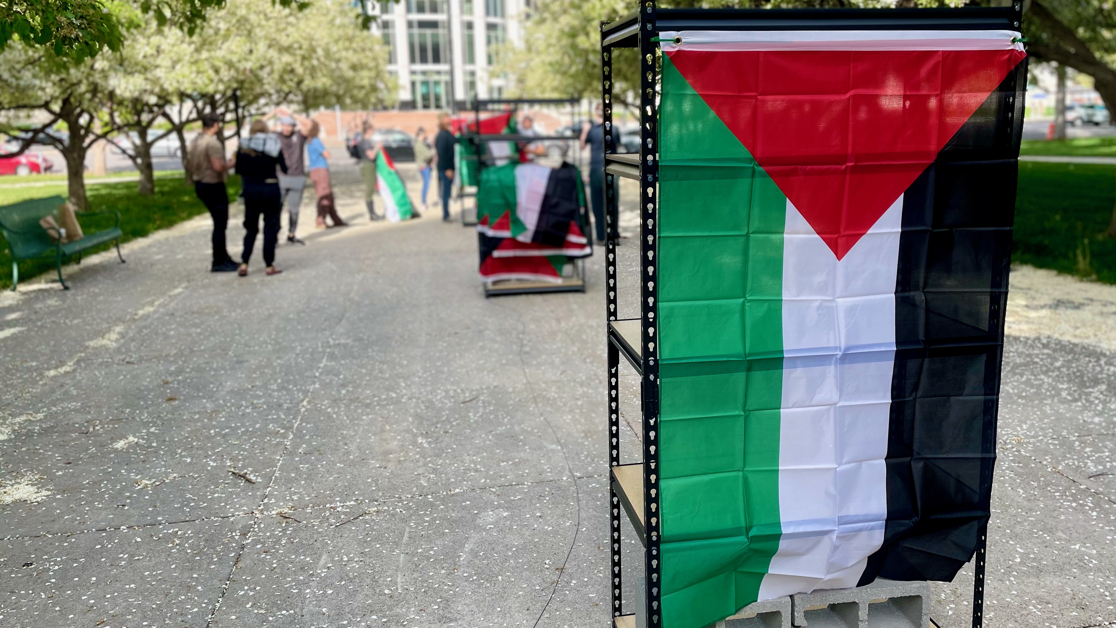 A Palestinian flag hangs at the Salt Lake City-County Building, where a memorial to Palestinians killed in the ongoing Israel-Hamas war in Gaza is taking shape in Salt Lake City Thursday.