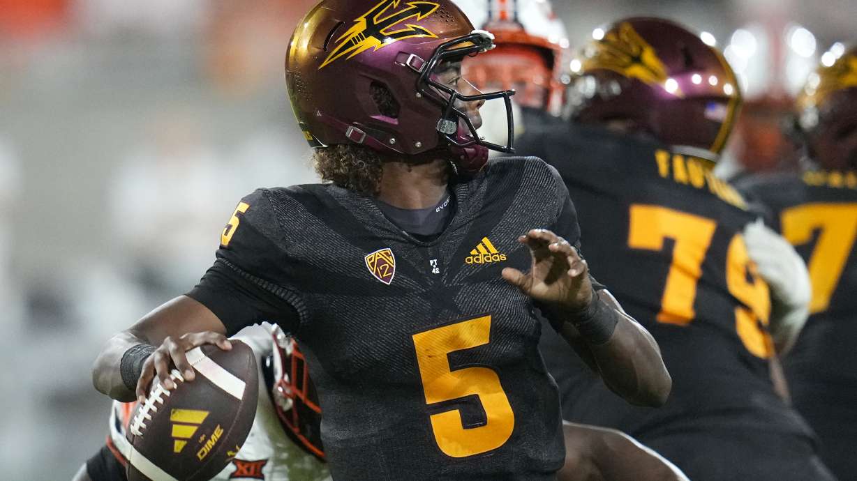 FILE - Arizona State quarterback Jaden Rashada throws a pass against Oklahoma State during the second half of an NCAA college football game Saturday, Sept. 9, 2023, in Tempe, Ariz. Rashada has committed to Georgia and is back in the Southeastern Conference after the one-time Florida commit's NIL deal fell apart.