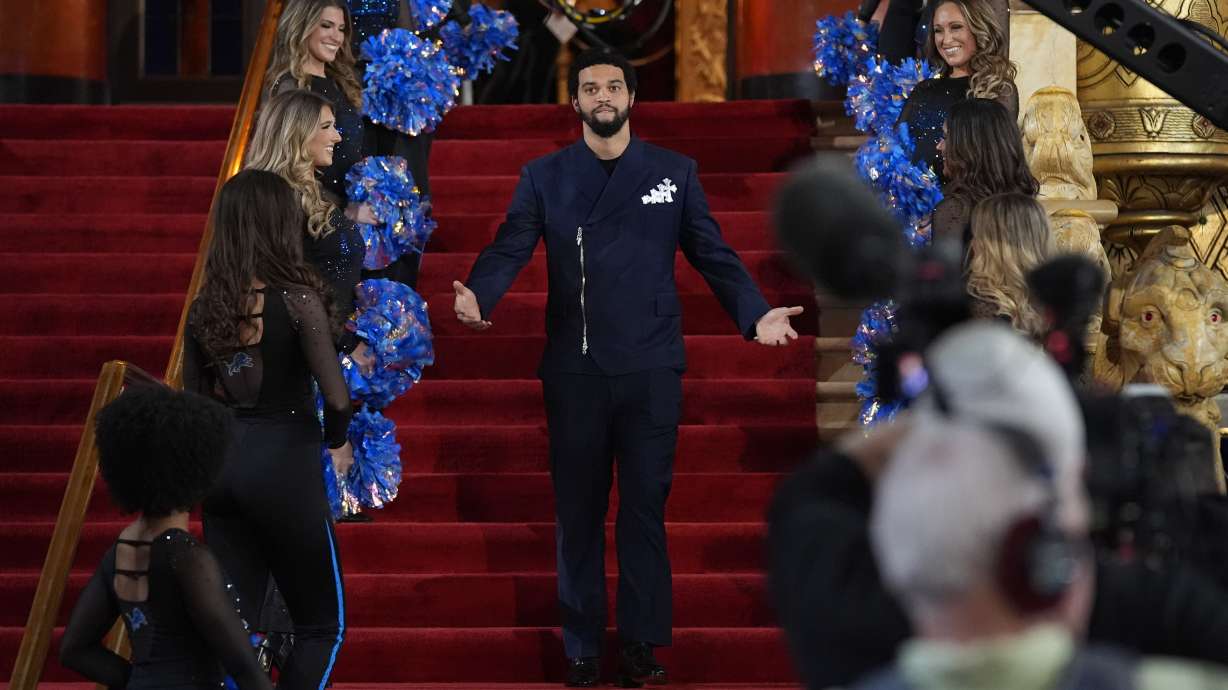 Southern California quarterback Caleb Williams poses on the red carpet ahead of the first round of the NFL football draft, Thursday, April 25, 2024, in Detroit.
