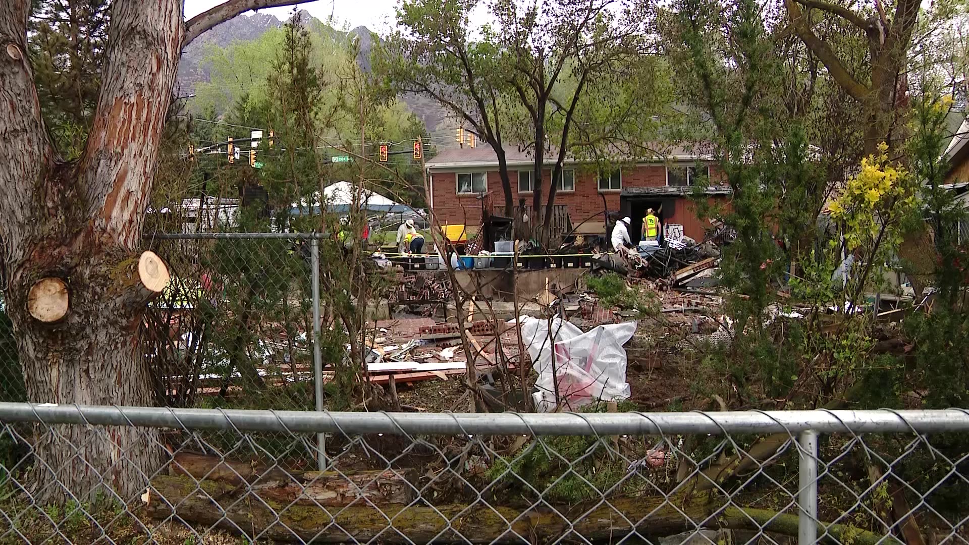 The remains of Teri Wojcik’s Holladay home is seen after authorities used a controlled detonation on the home.