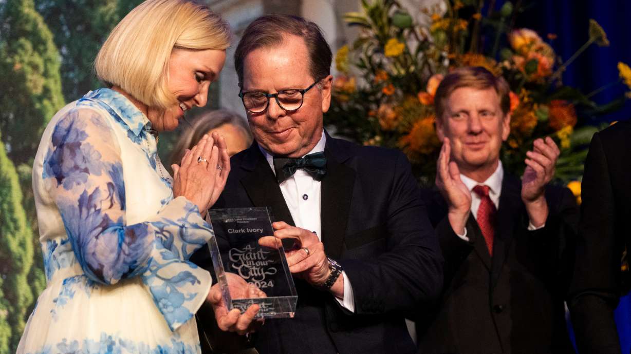 Clark Ivory is honored as the 45th Giant in our City during the Salt Lake Chamber's annual awards banquet at the Grand America Hotel in Salt Lake City on Thursday.