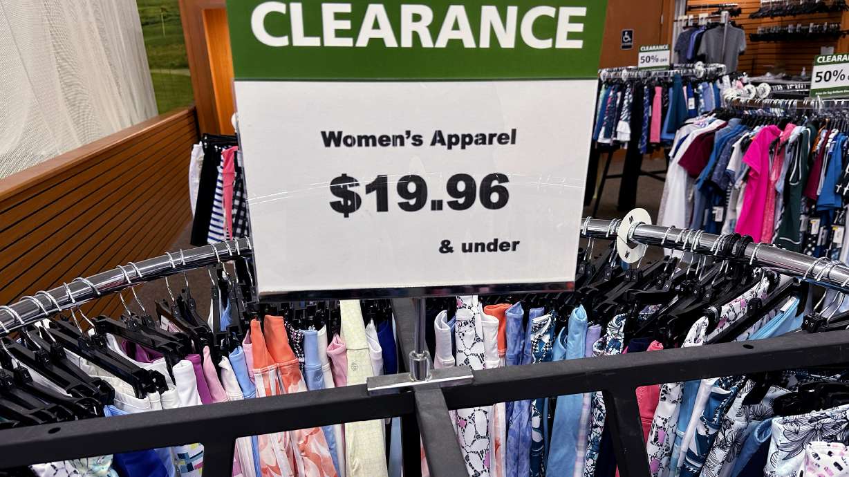 A clearance sign is displayed at a retail clothing store in Downers Grove, Ill., April 1. On Friday, the Commerce Department issues its March report on consumer spending.