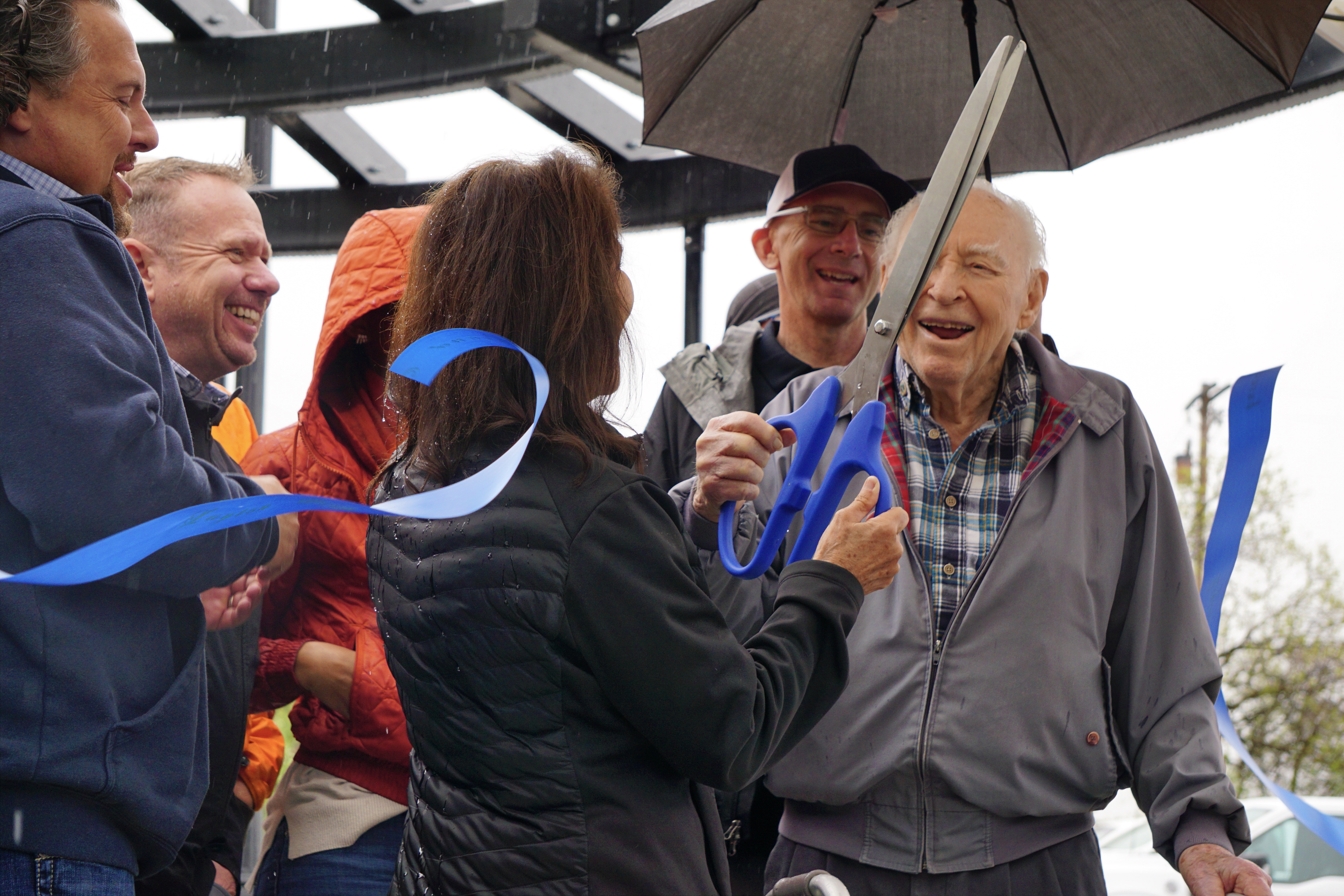 Layton Mayor Joy Petro and Elias Harris Adams cut a ribbon commemorating the new amenities at the Adams Canyon trailhead Friday.
